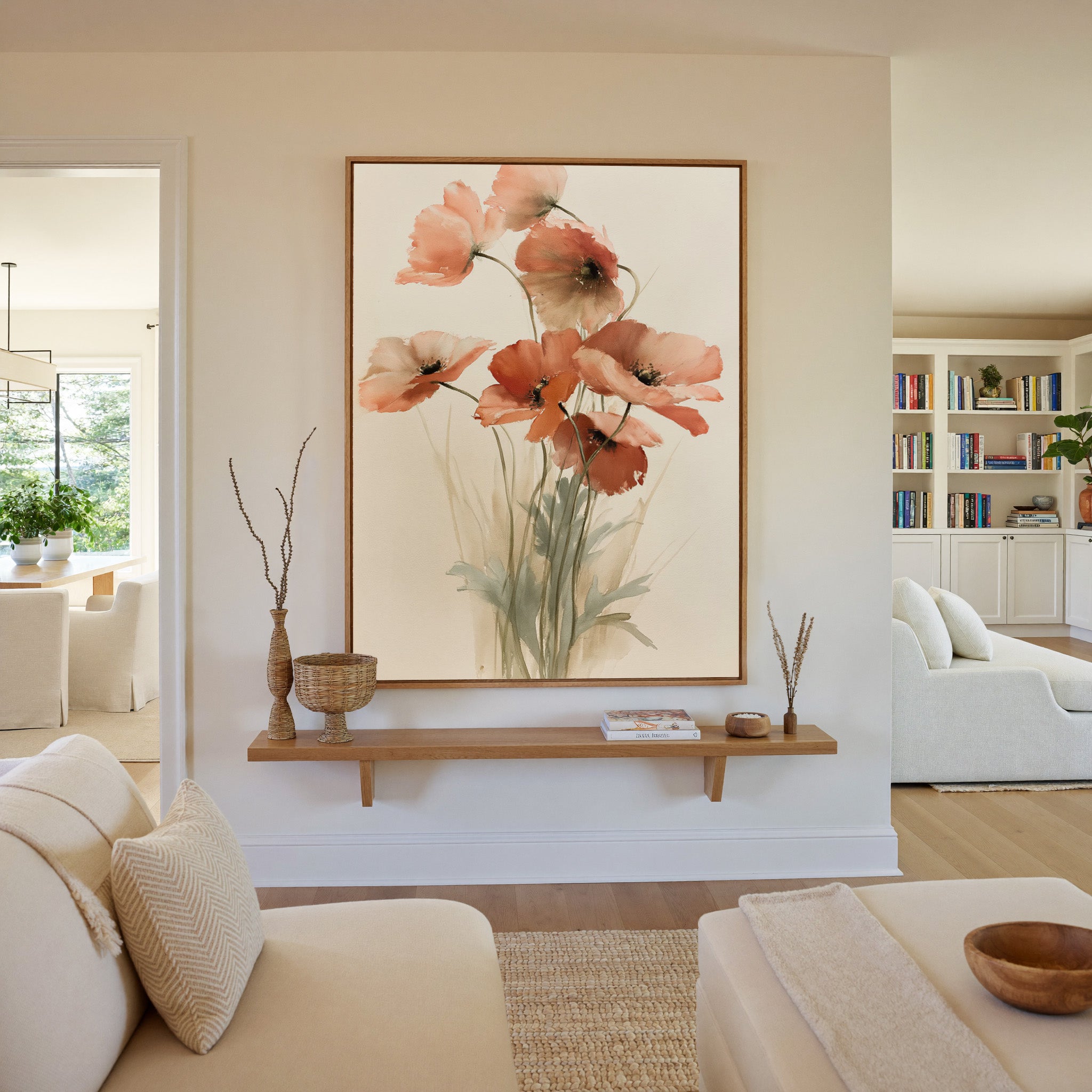 soft coral poppy flowers with thin stems canvas wall art in an oak frame in a living room