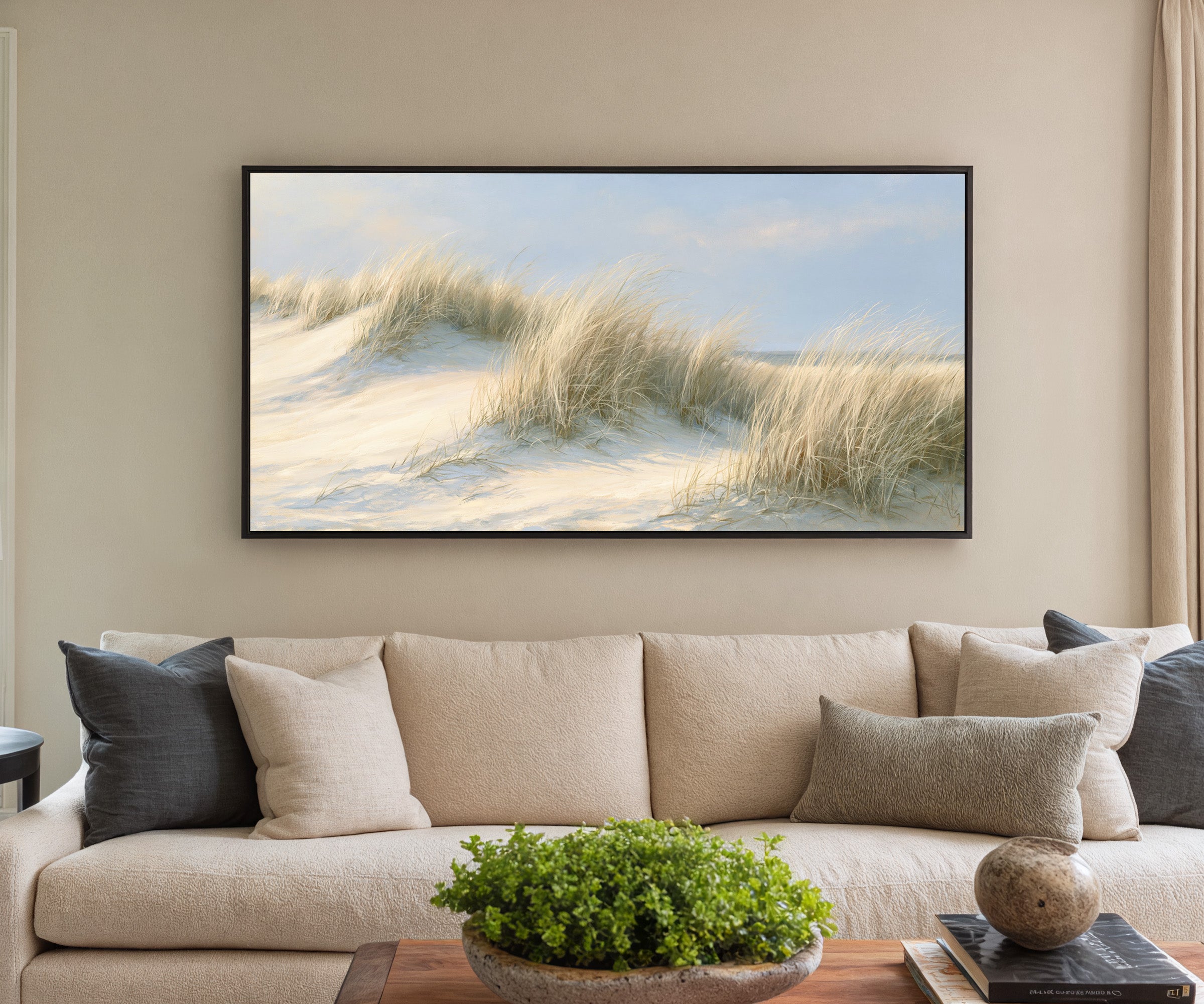 pale dune grass on soft sand canvas wall art in a black frame in a styled room setting