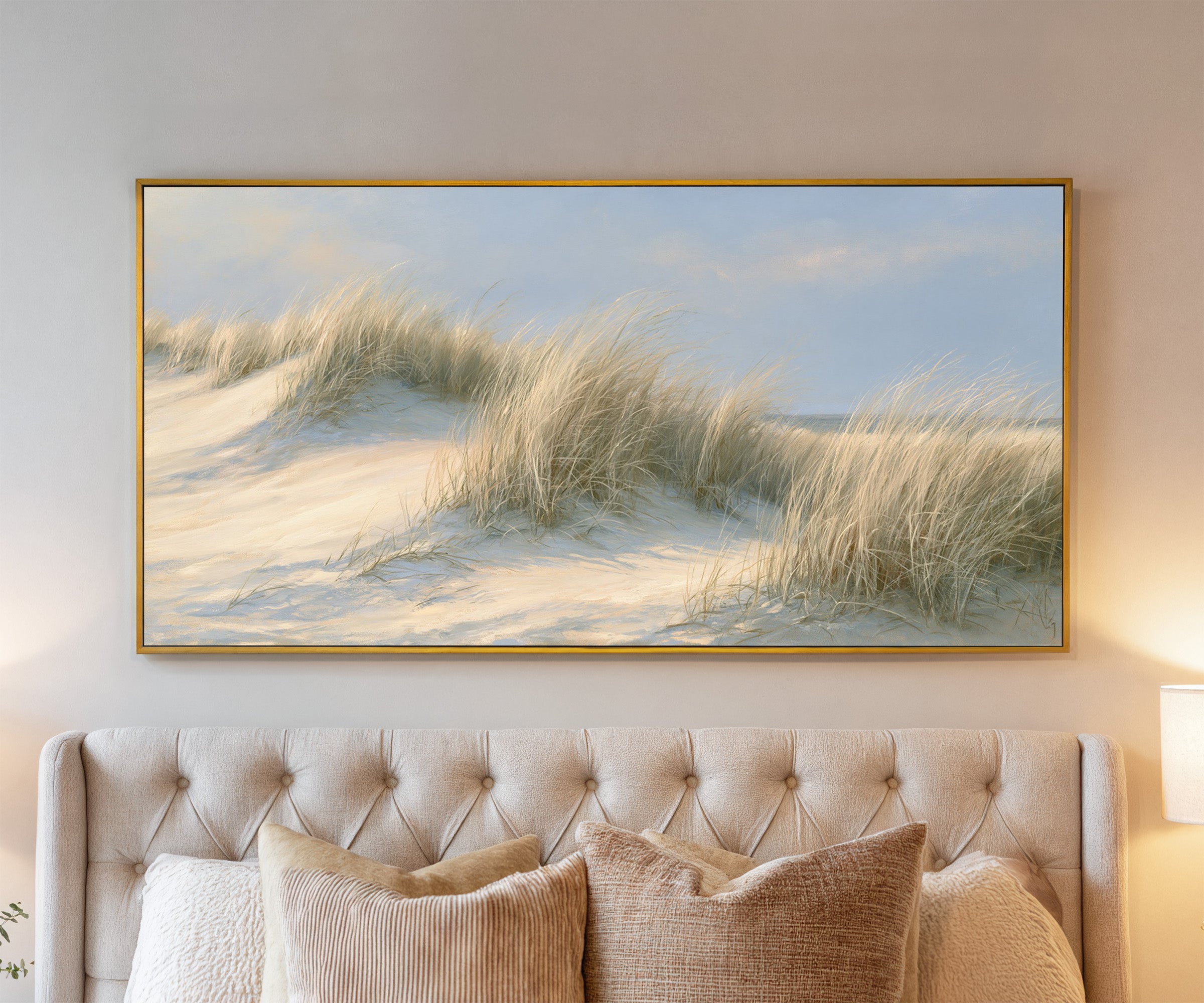 pale dune grass on soft sand canvas wall art in a gold frame above a bed