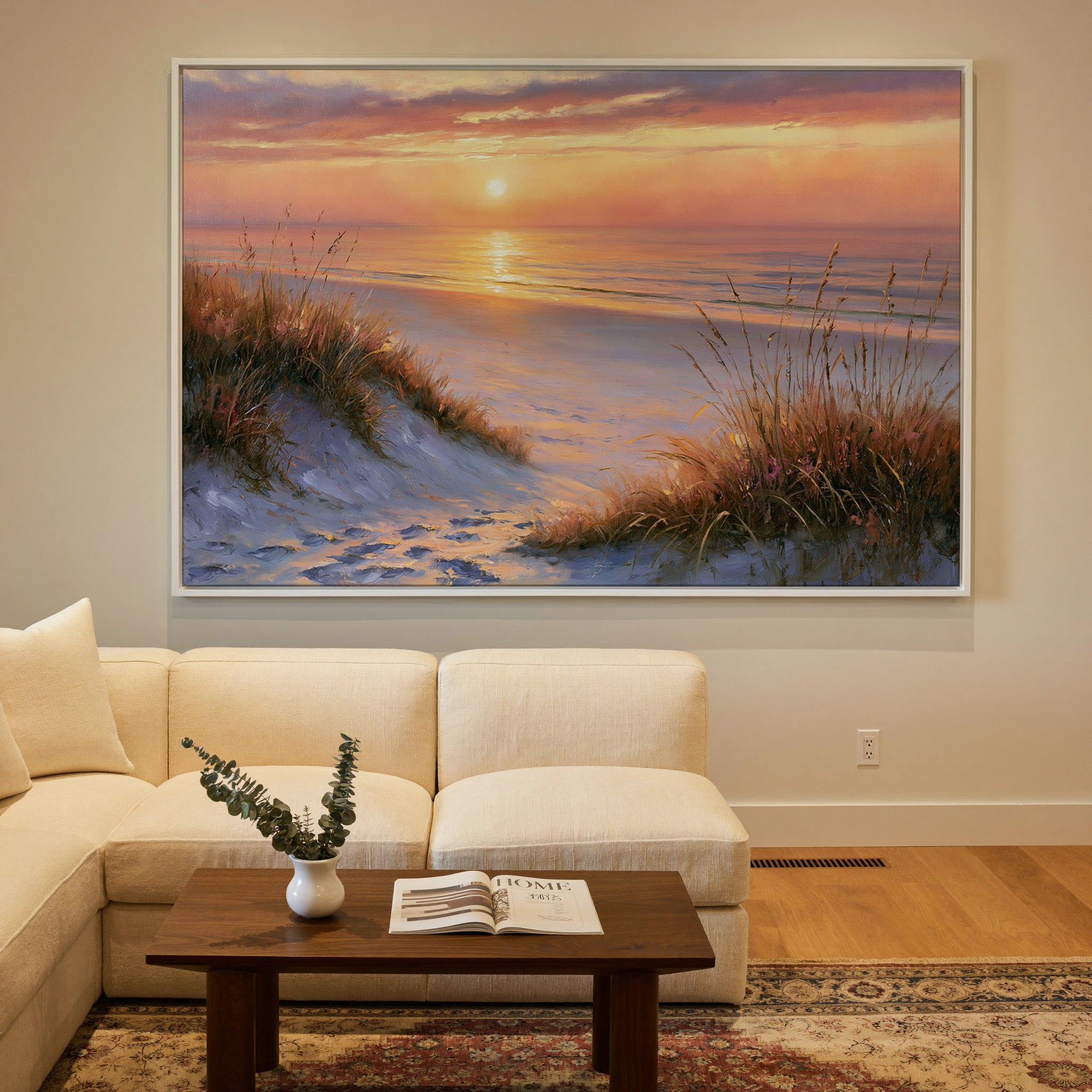 golden hour beach with dune grass and a calm sea canvas wall art in a white frame in a styled room setting
