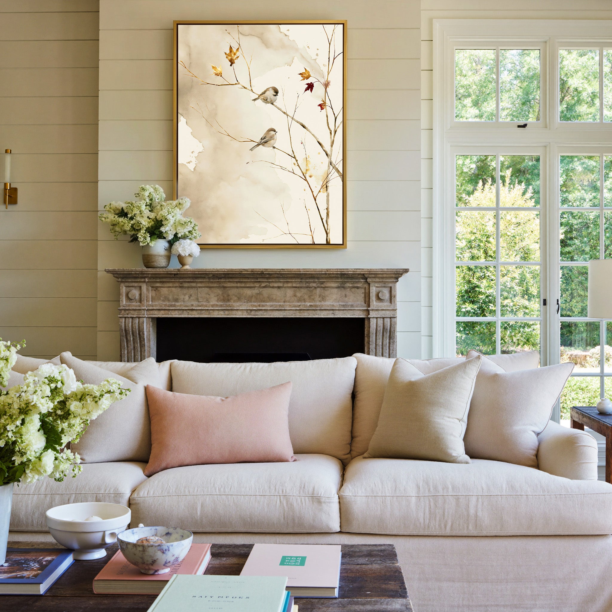 pair of small songbirds on bare autumn branches canvas wall art in a gold frame above a mantel