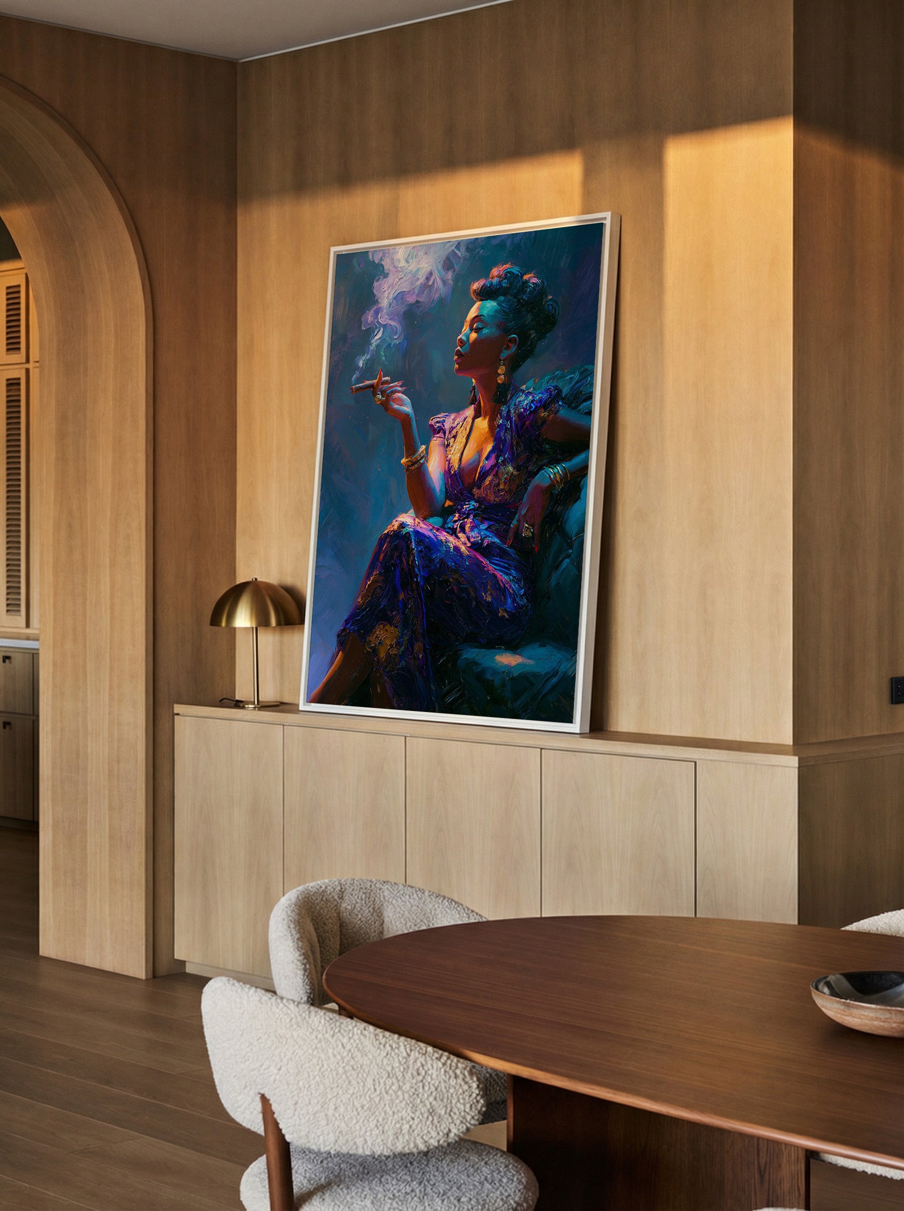 jewel toned portrait with blue light and smoke canvas wall art in a white frame in a styled room setting
