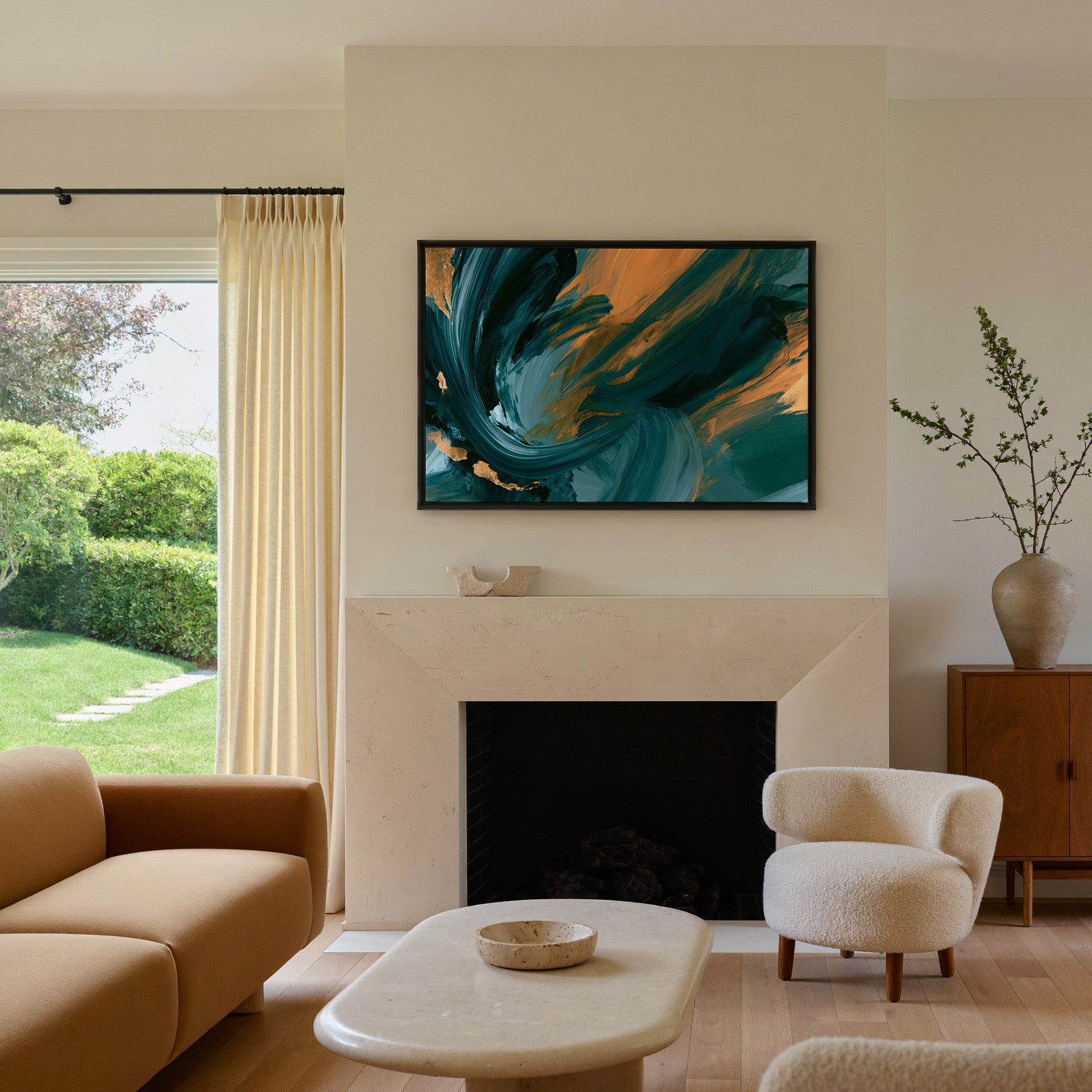teal and copper abstract with sweeping arcs canvas wall art in a black frame above a mantel