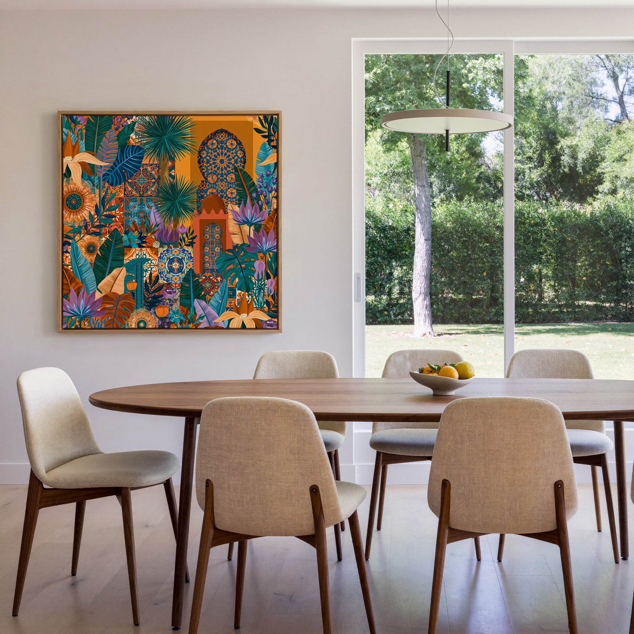 teal leaves with orange tile motifs canvas wall art in an oak frame in a dining room