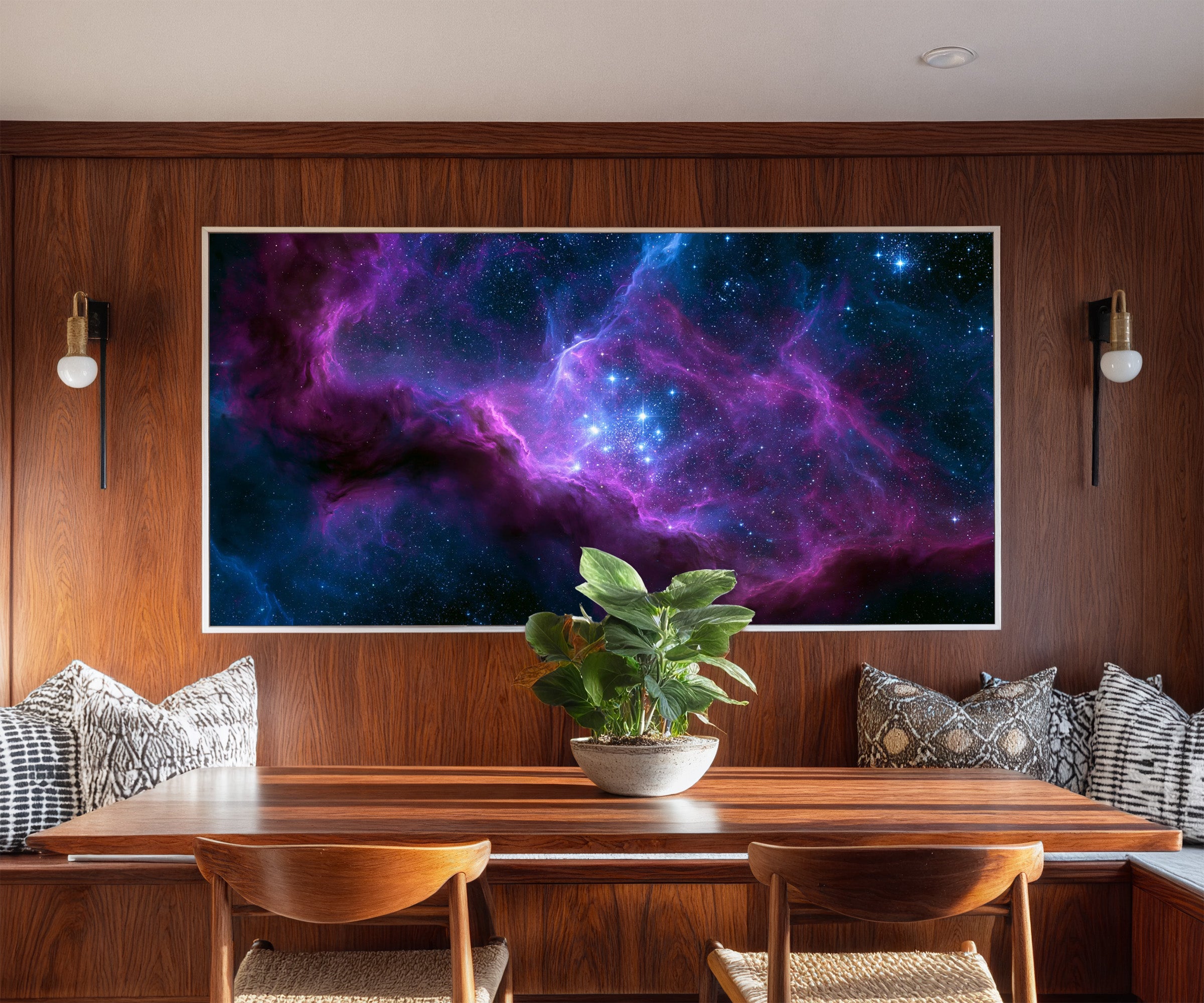violet and blue nebula with bright star cluster canvas wall art in a white frame in a styled room setting