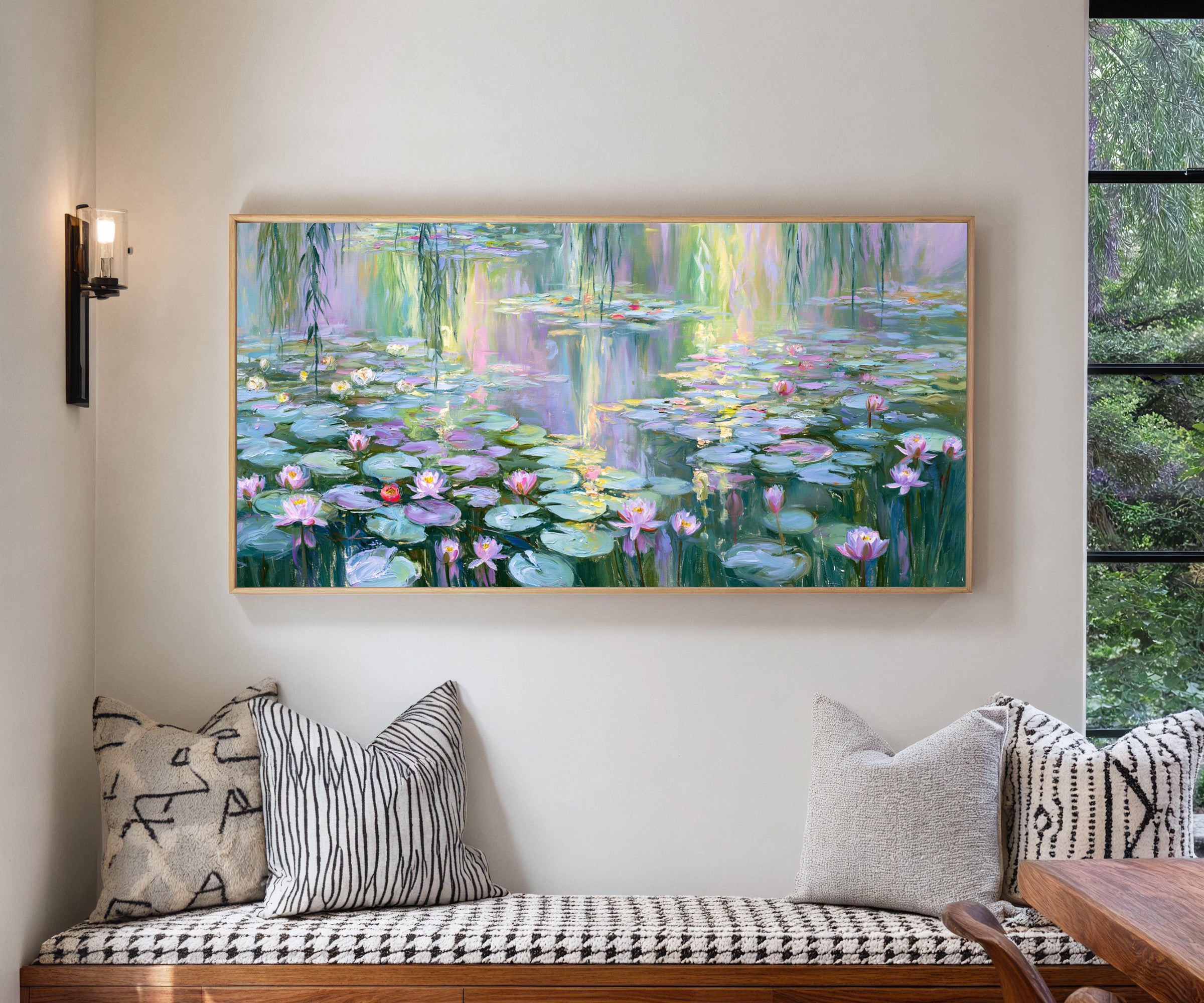 pastel water lily pond with reflected light canvas wall art in a natural wood frame in a living room