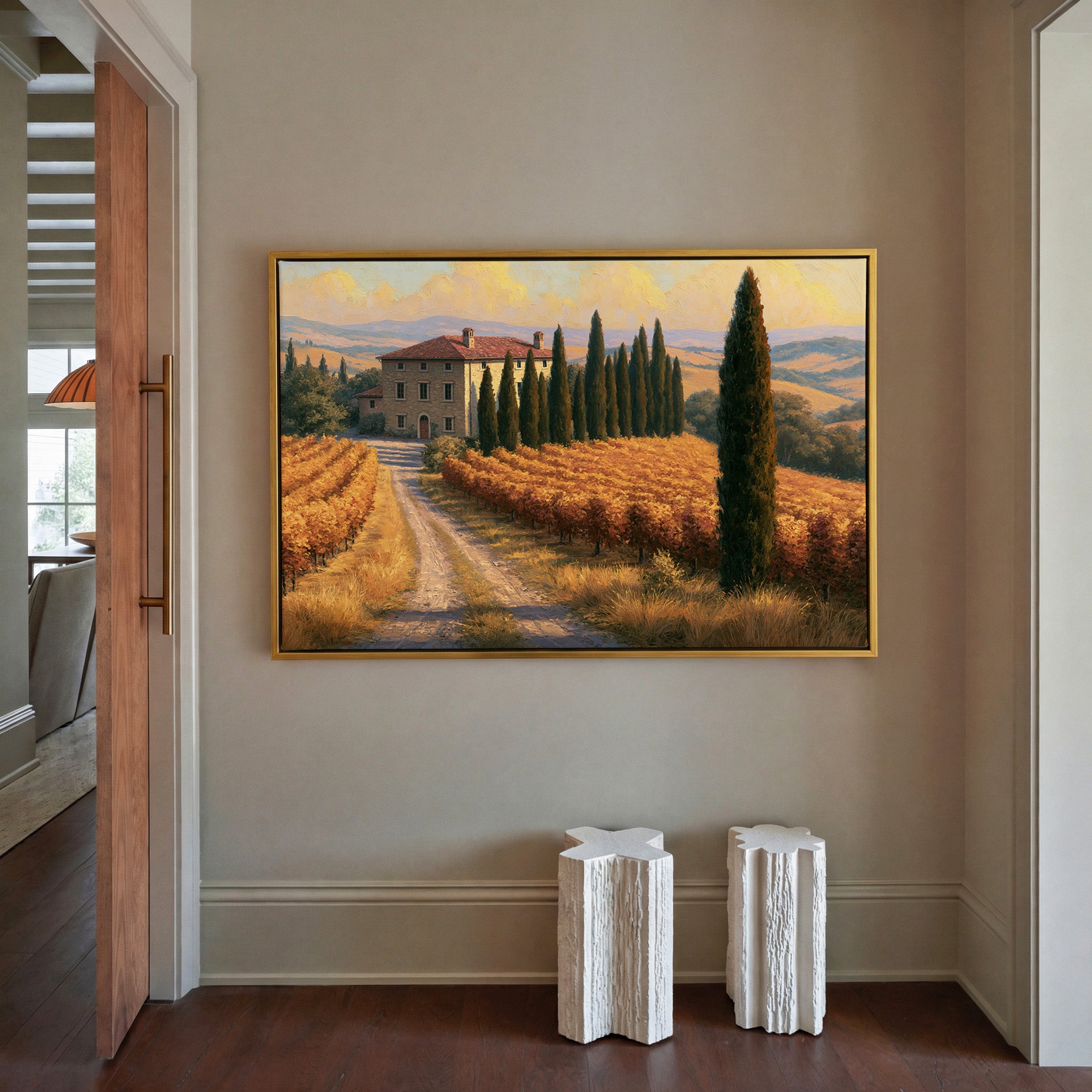 golden vineyard rows with cypress trees canvas wall art in a gold frame in a styled room setting