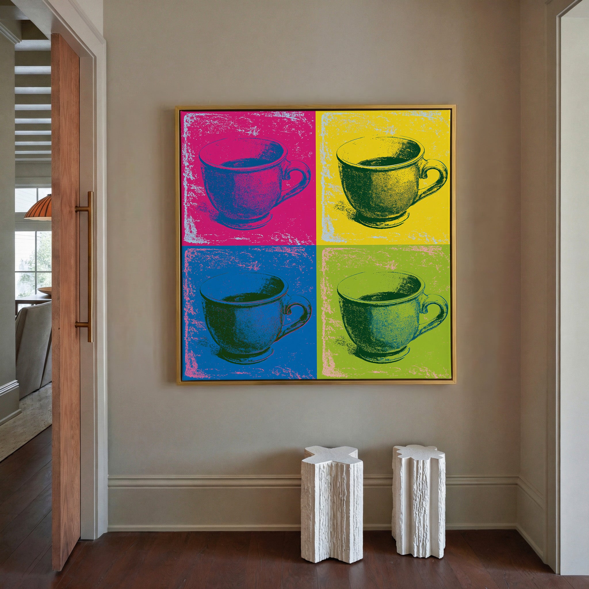pop art teacup grid in magenta, yellow, blue, canvas wall art in a gold frame in a styled room setting