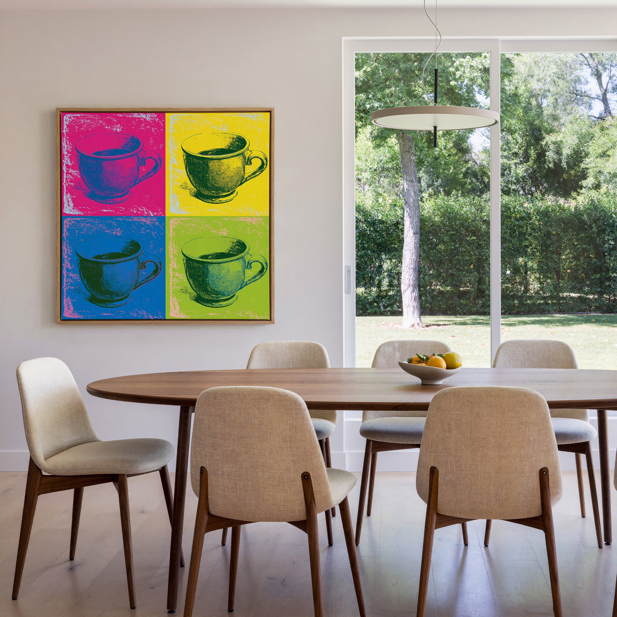 pop art teacup grid in magenta, yellow, blue, canvas wall art in an oak frame in a dining room