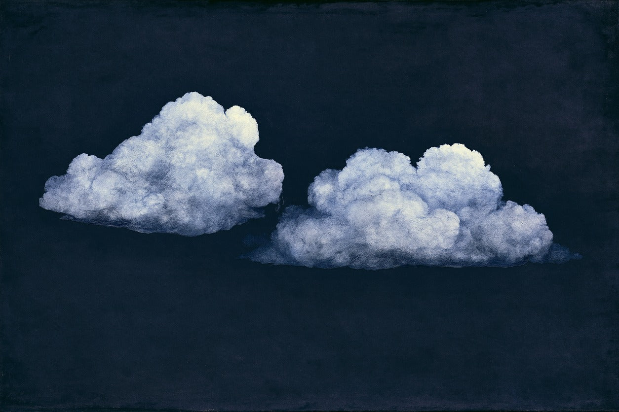 Two pale cloud forms on a deep navy field, spaced apart with soft blue-gray edges