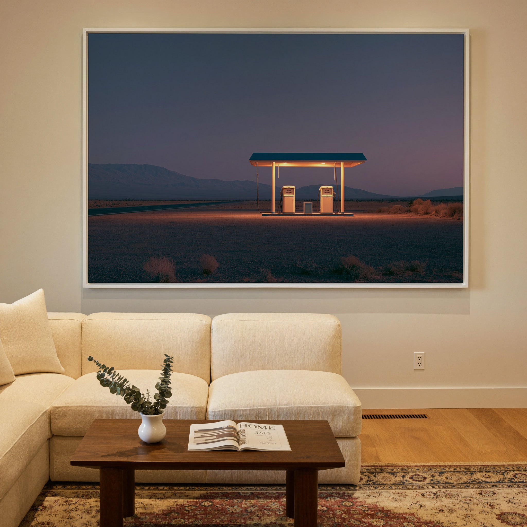 lonely desert gas station at blue hour canvas wall art in a white frame in a styled room setting
