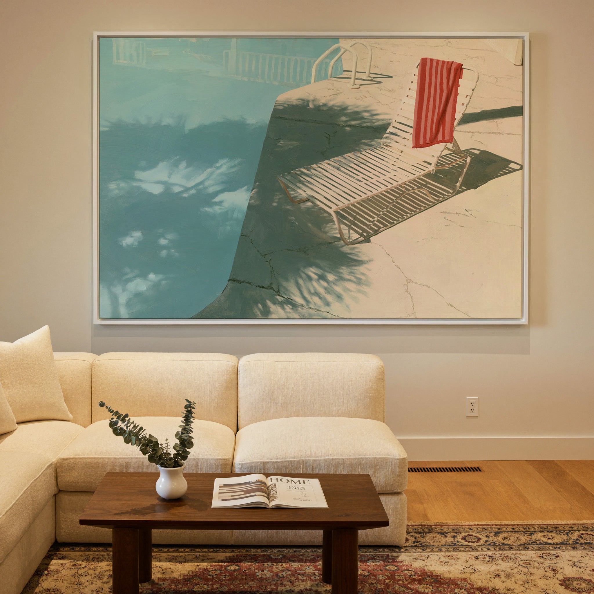 sunlit turquoise pool with striped lounge chair canvas wall art in a white frame in a styled room setting