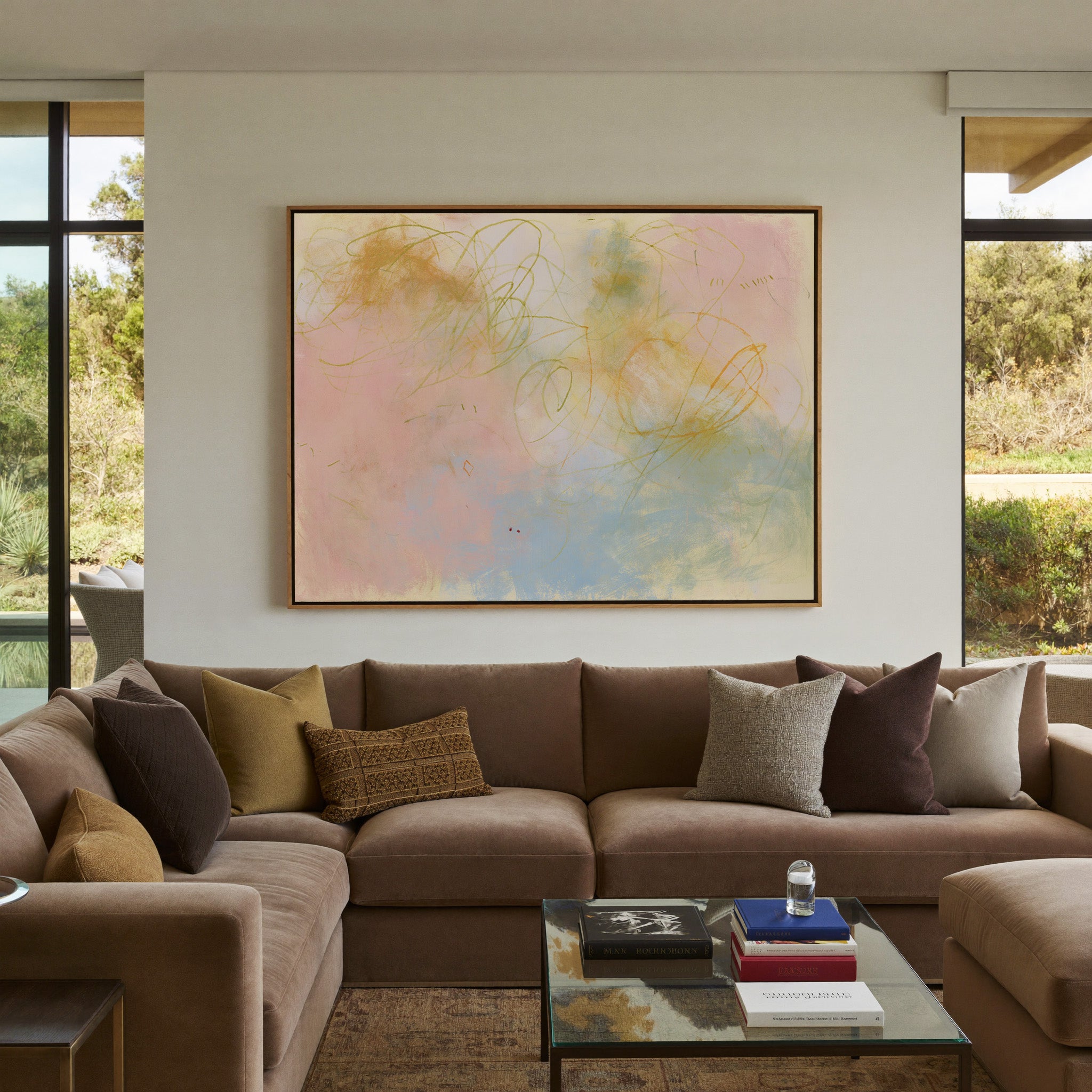 soft pastel abstract with looping lines canvas wall art in an oak frame in a styled room setting