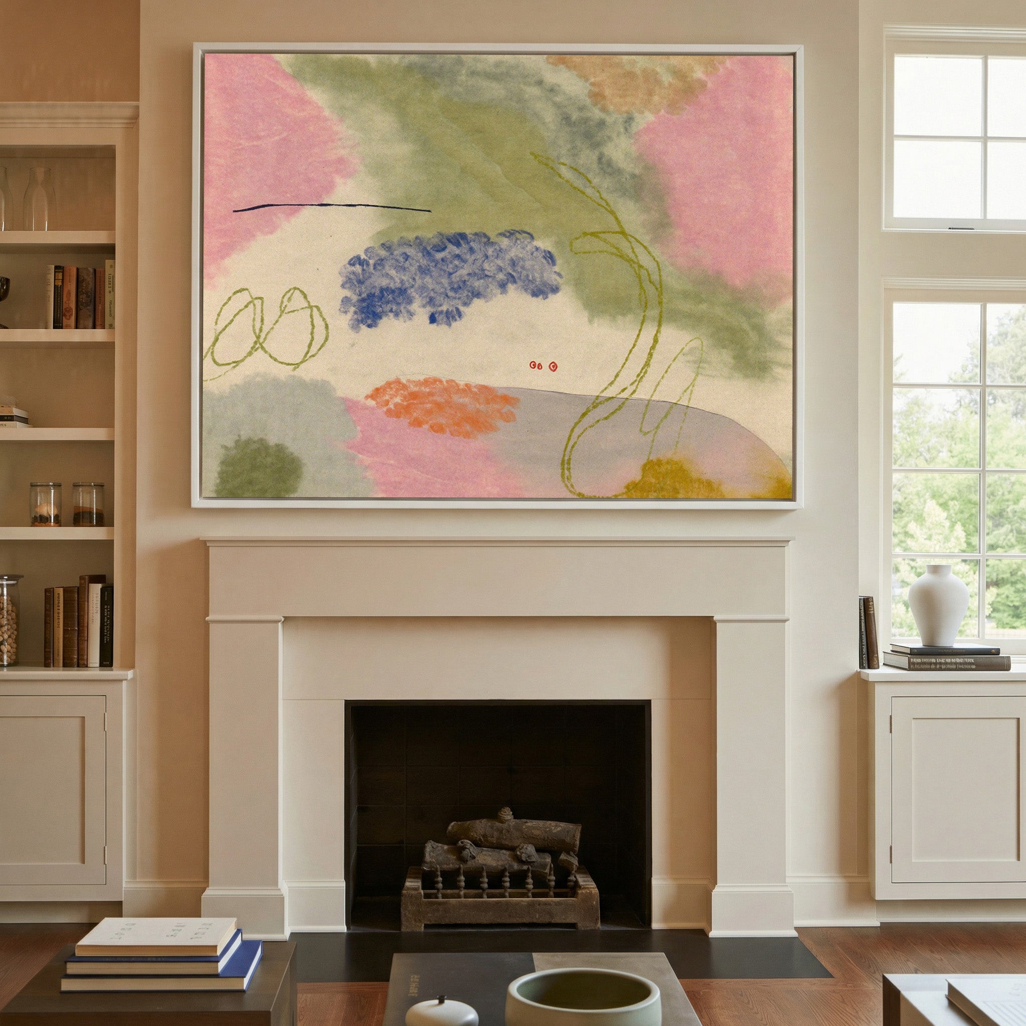 soft pink, green, blue, and orange abstract canvas wall art in a white frame above a mantel