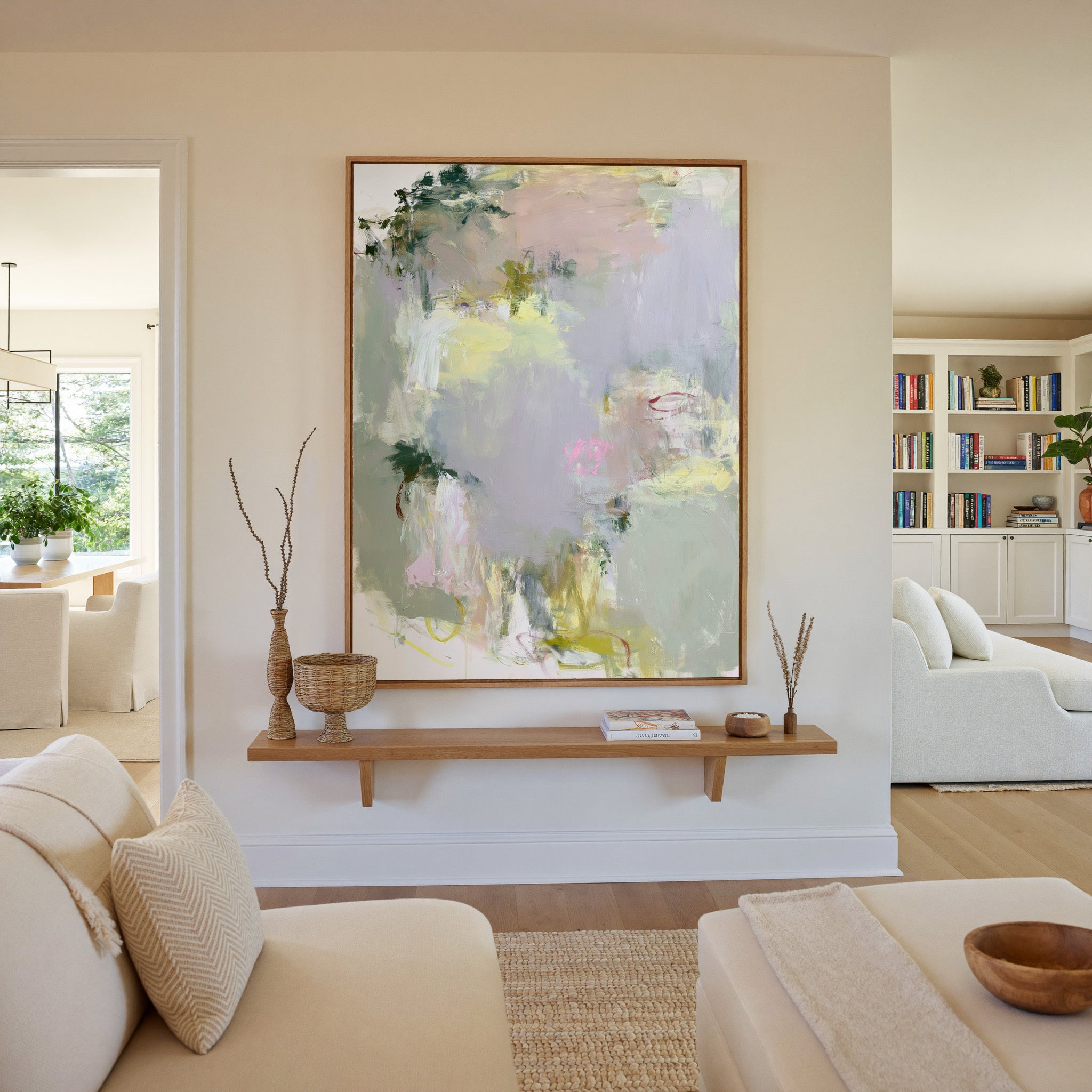 soft pastel abstract with pale lilac, blush, canvas wall art in an oak frame in a living room