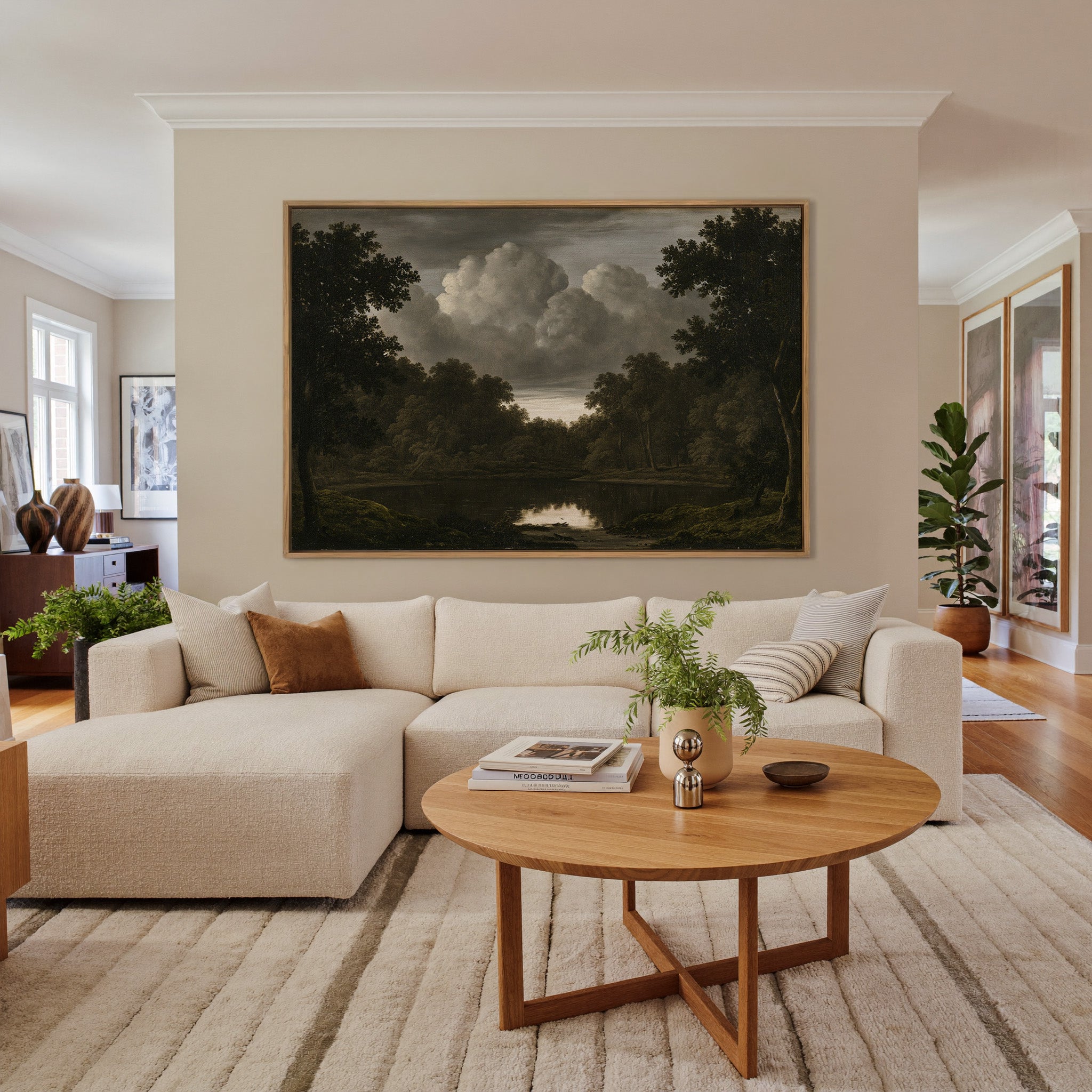 dark woodland pool beneath heavy storm clouds canvas wall art in an oak frame in a living room
