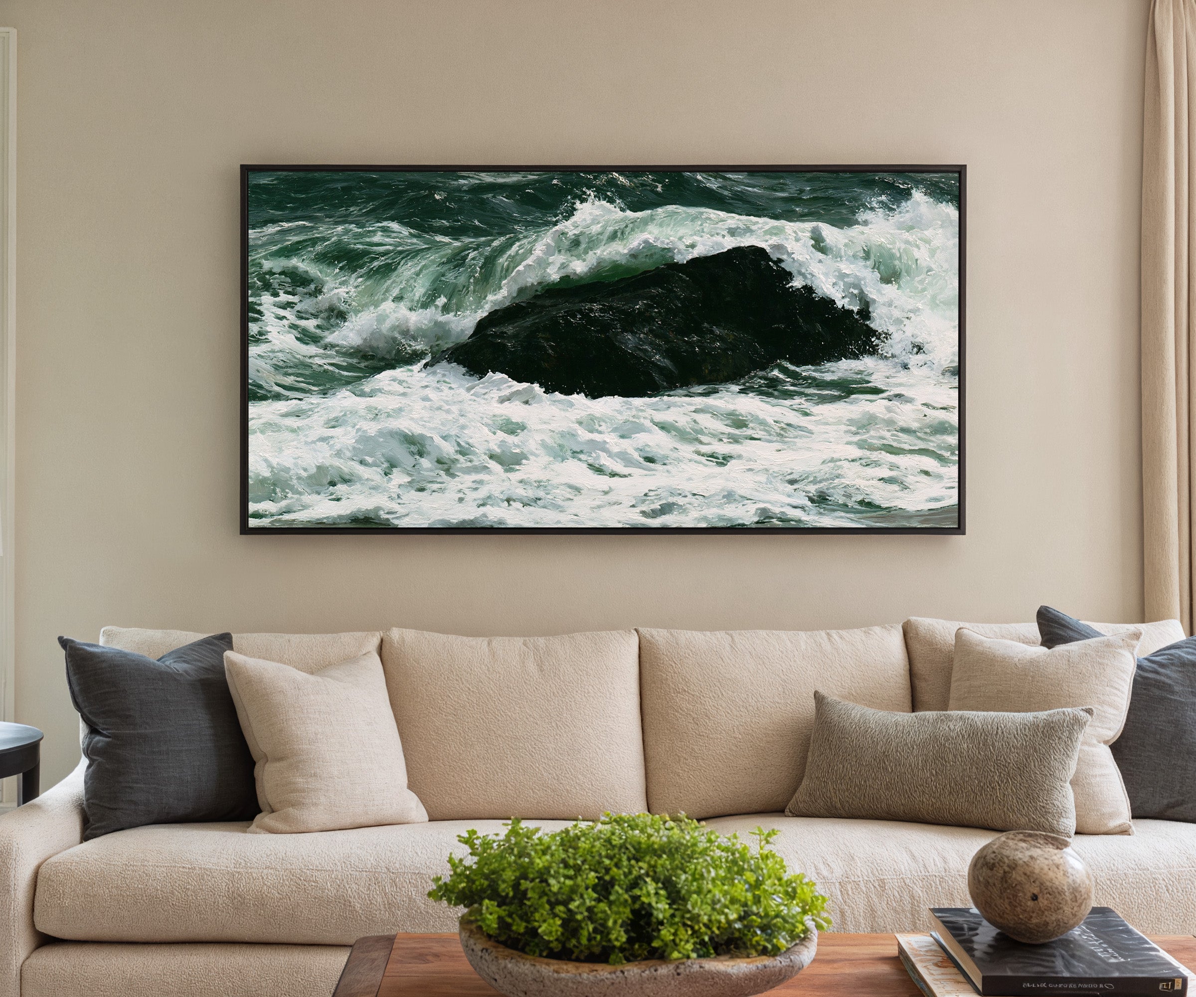 dark atlantic wave breaking over black rock canvas wall art in a black frame in a styled room setting