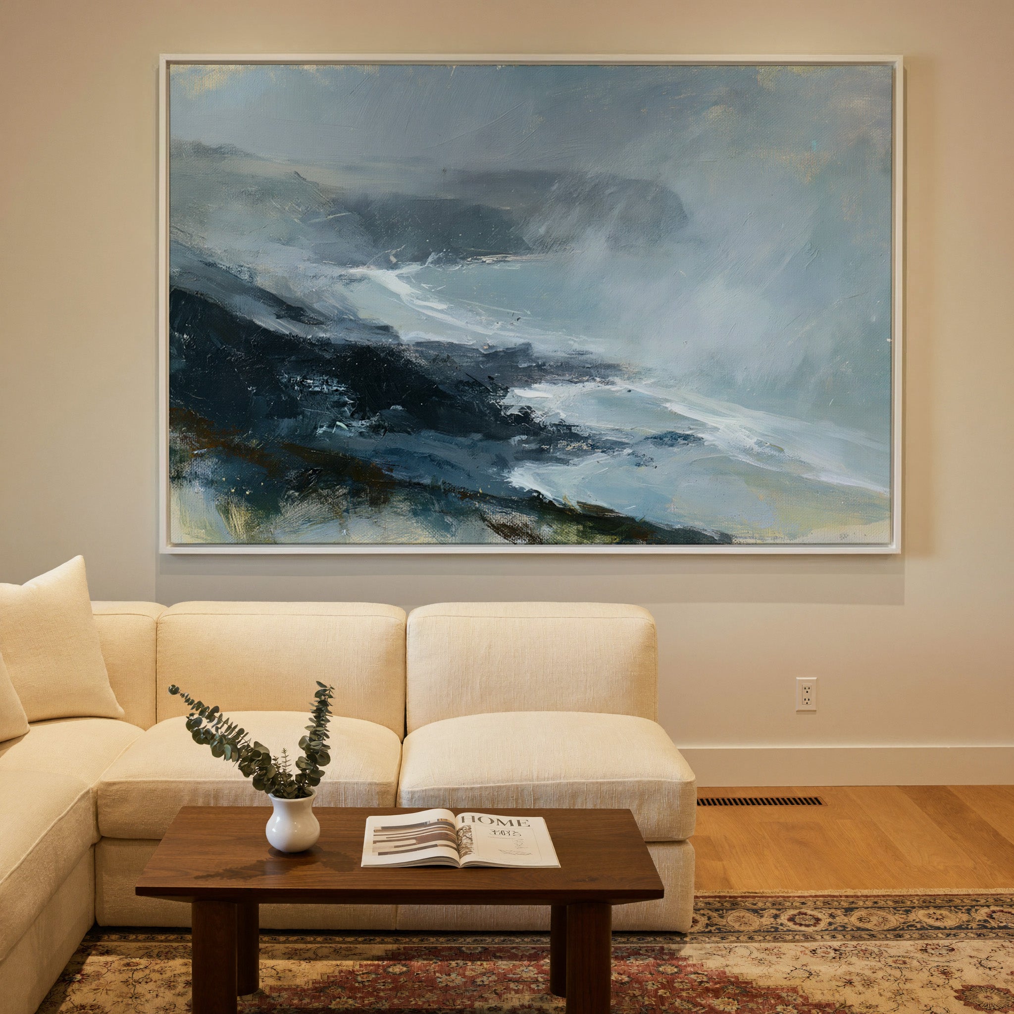 windswept coastal headland in rain and mist canvas wall art in a white frame in a styled room setting