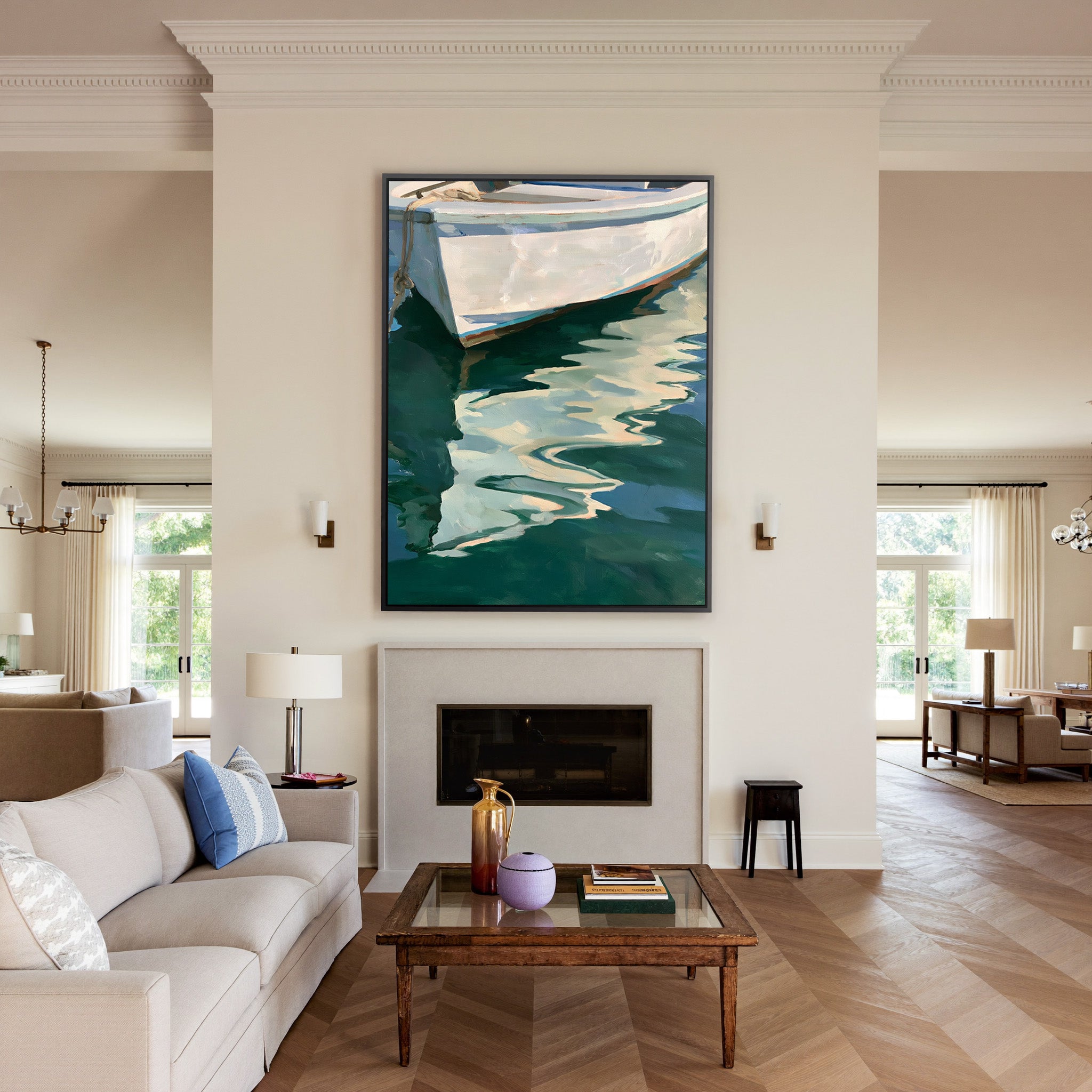 white boat hull over deep green water canvas wall art in a black frame above a mantel