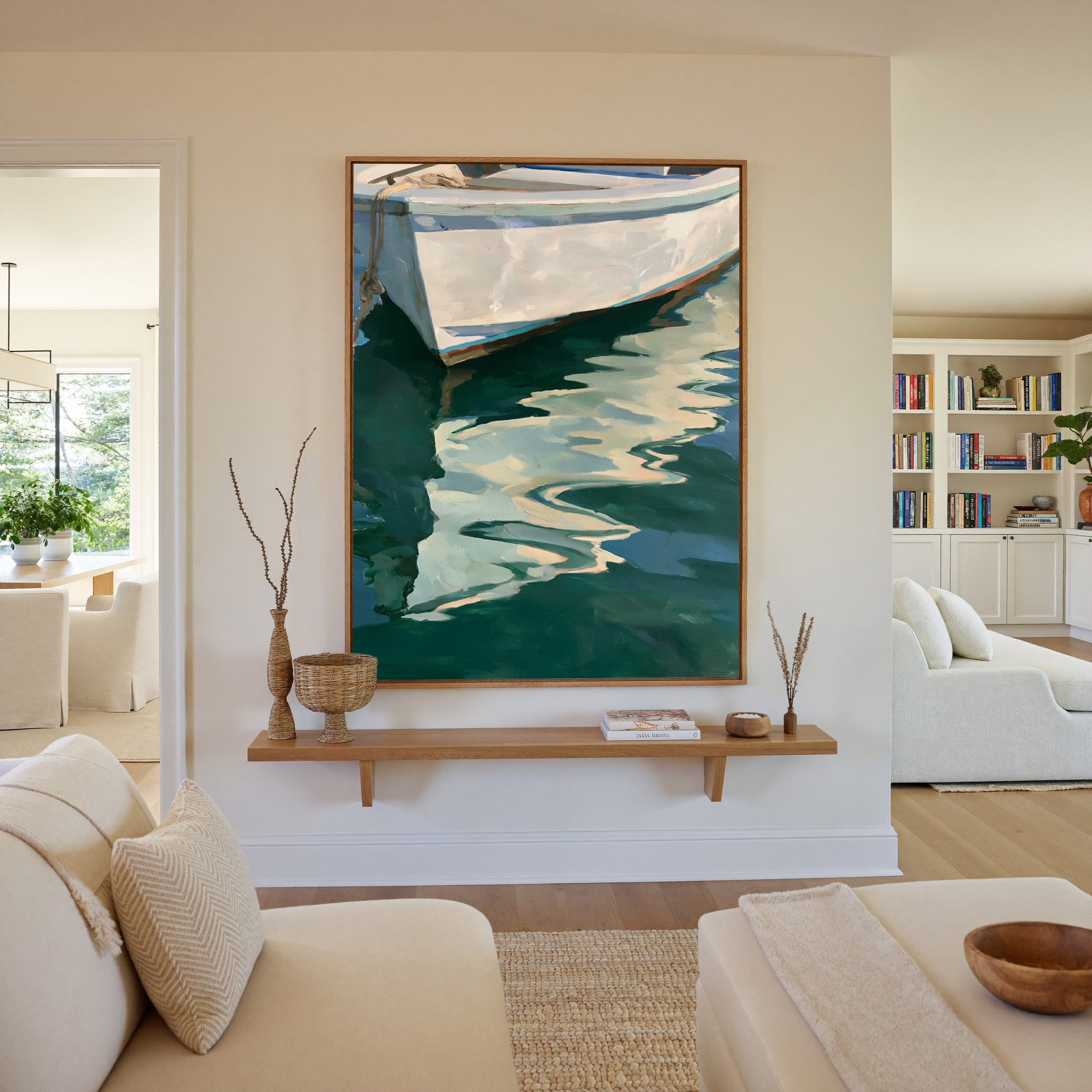 white boat hull over deep green water canvas wall art in an oak frame in a living room