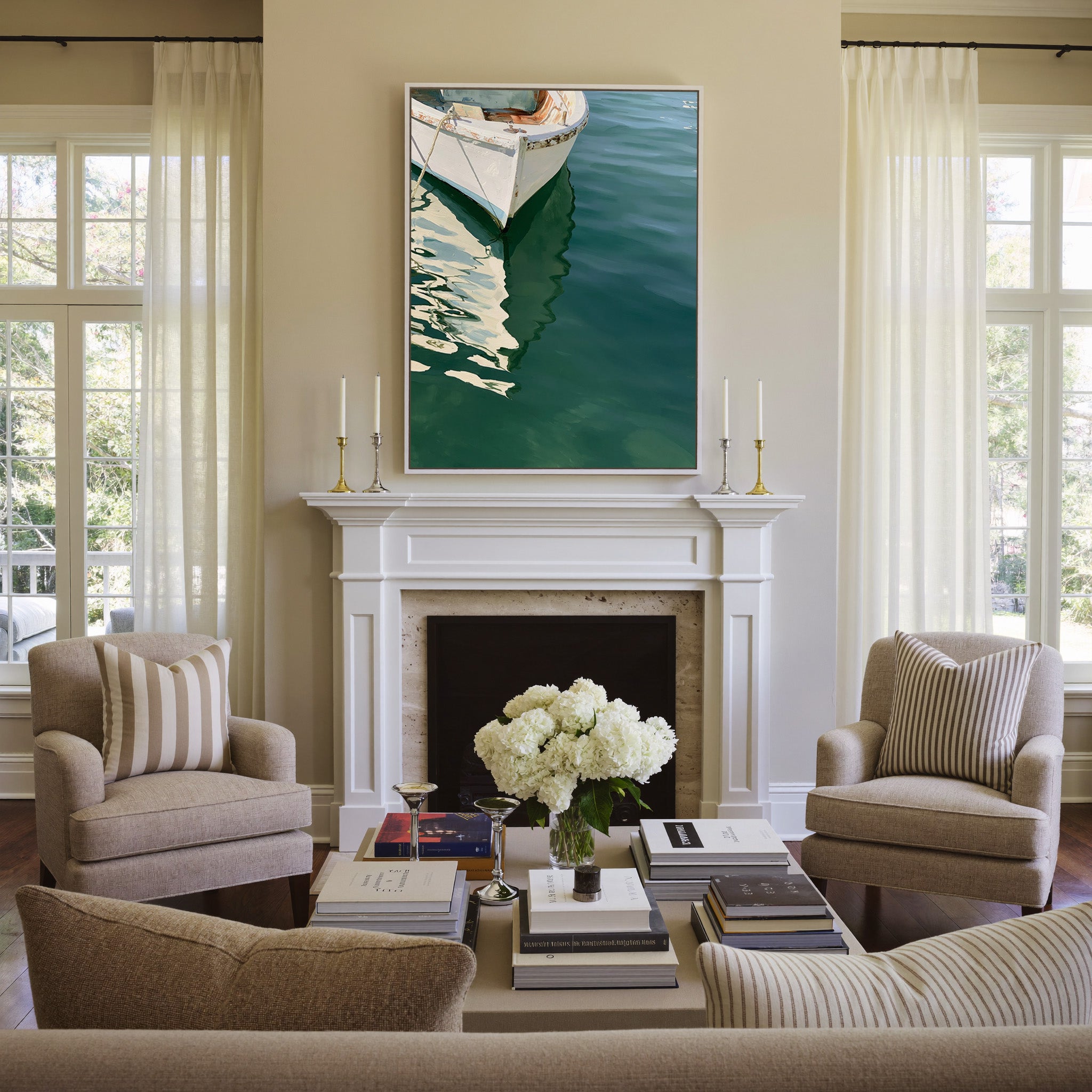 cropped white bow over deep green water canvas wall art in a white frame above a mantel