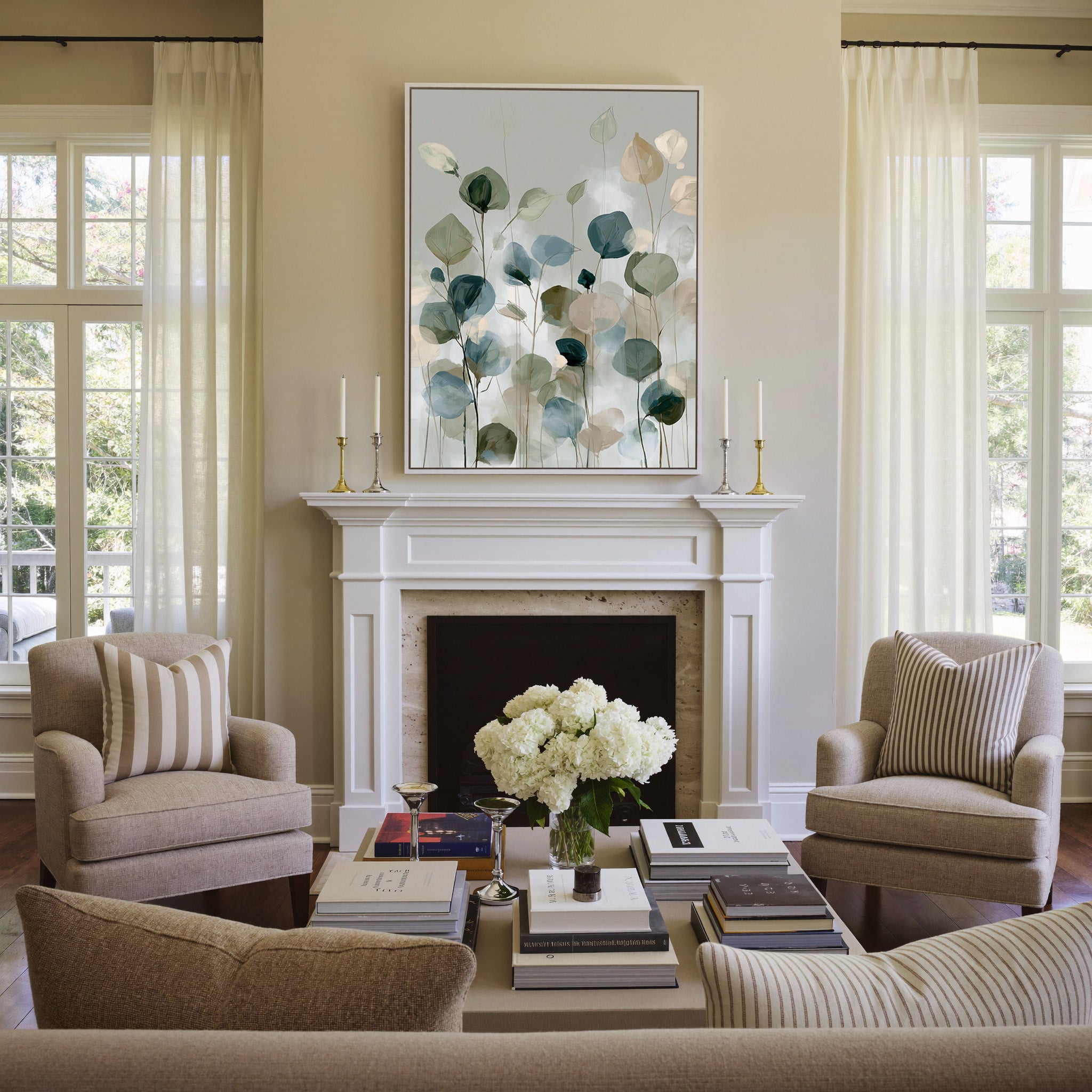 soft eucalyptus like leaves in muted green, canvas wall art in a white frame above a mantel