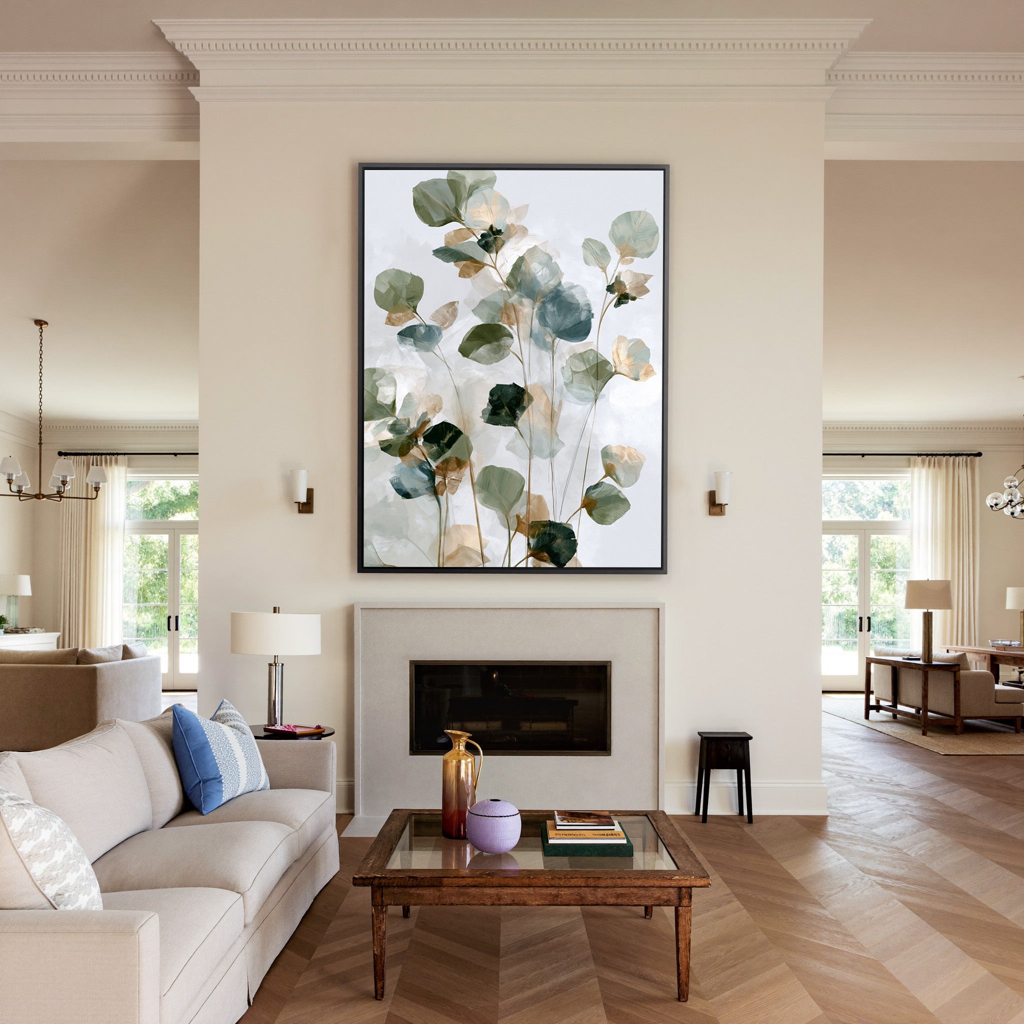 soft eucalyptus like leaves in sage, blue gray, canvas wall art in a black frame above a mantel