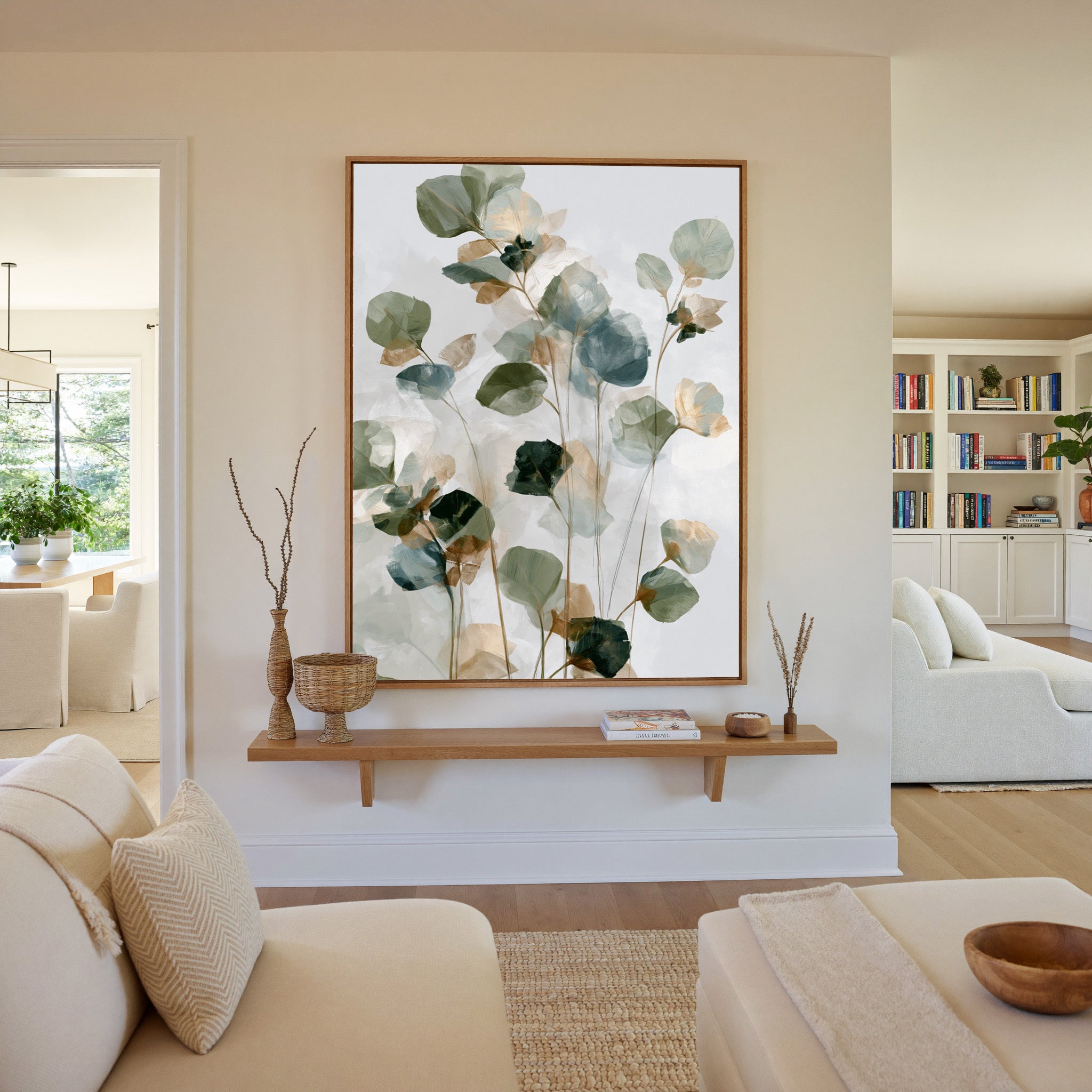 soft eucalyptus like leaves in sage, blue gray, canvas wall art in an oak frame in a living room