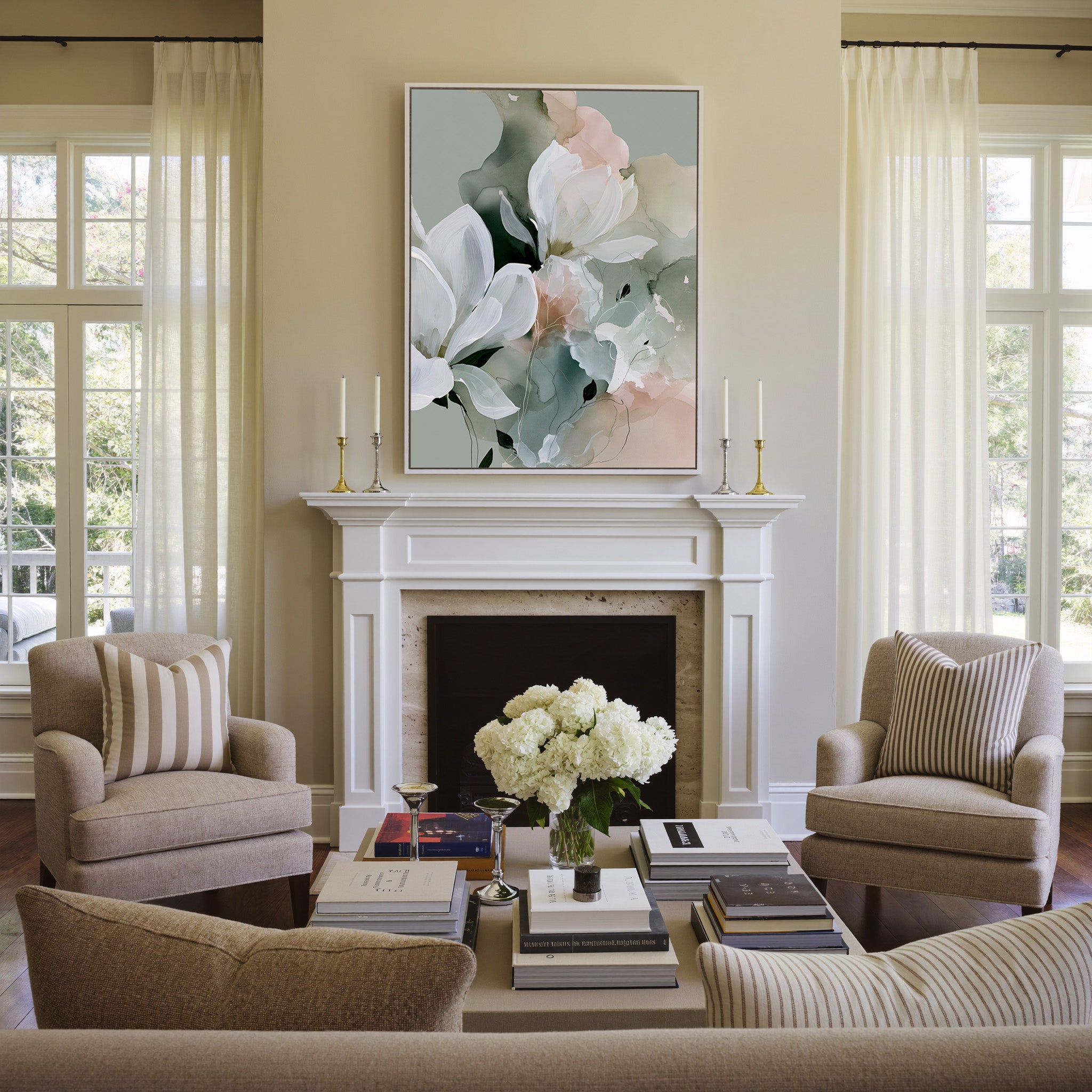 white blossoms over sage and blush layers canvas wall art in a white frame above a mantel