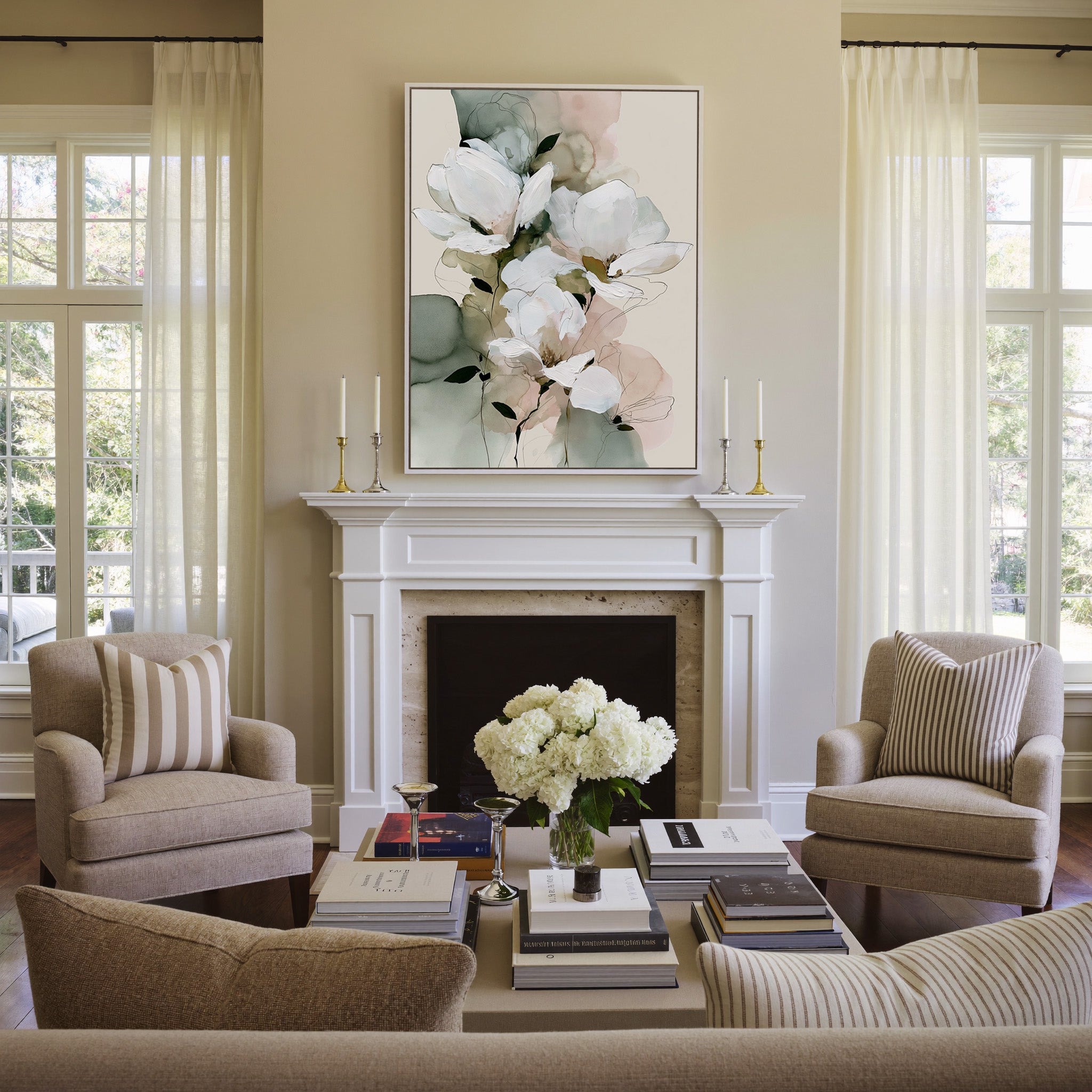 white magnolia like blooms with sage and blush canvas wall art in a white frame above a mantel