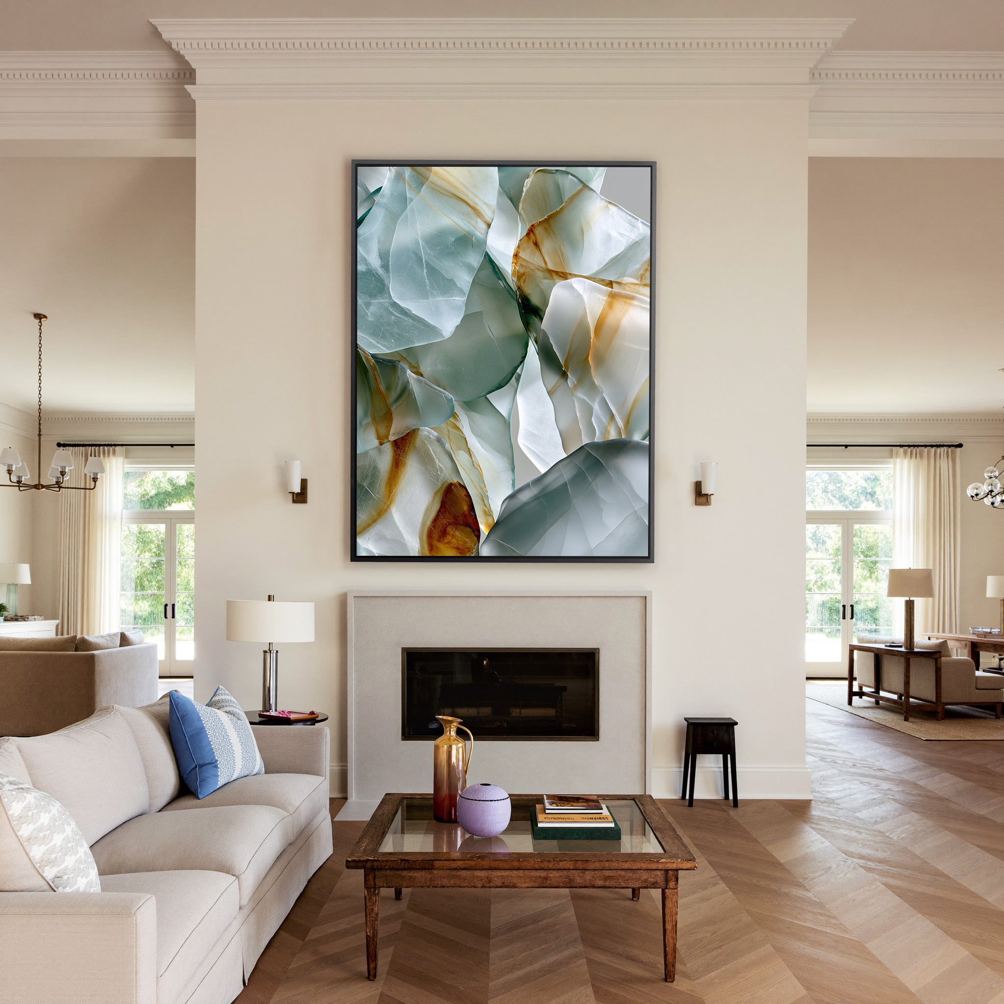 soft sea glass abstract with pale aqua, white, canvas wall art in a black frame above a mantel