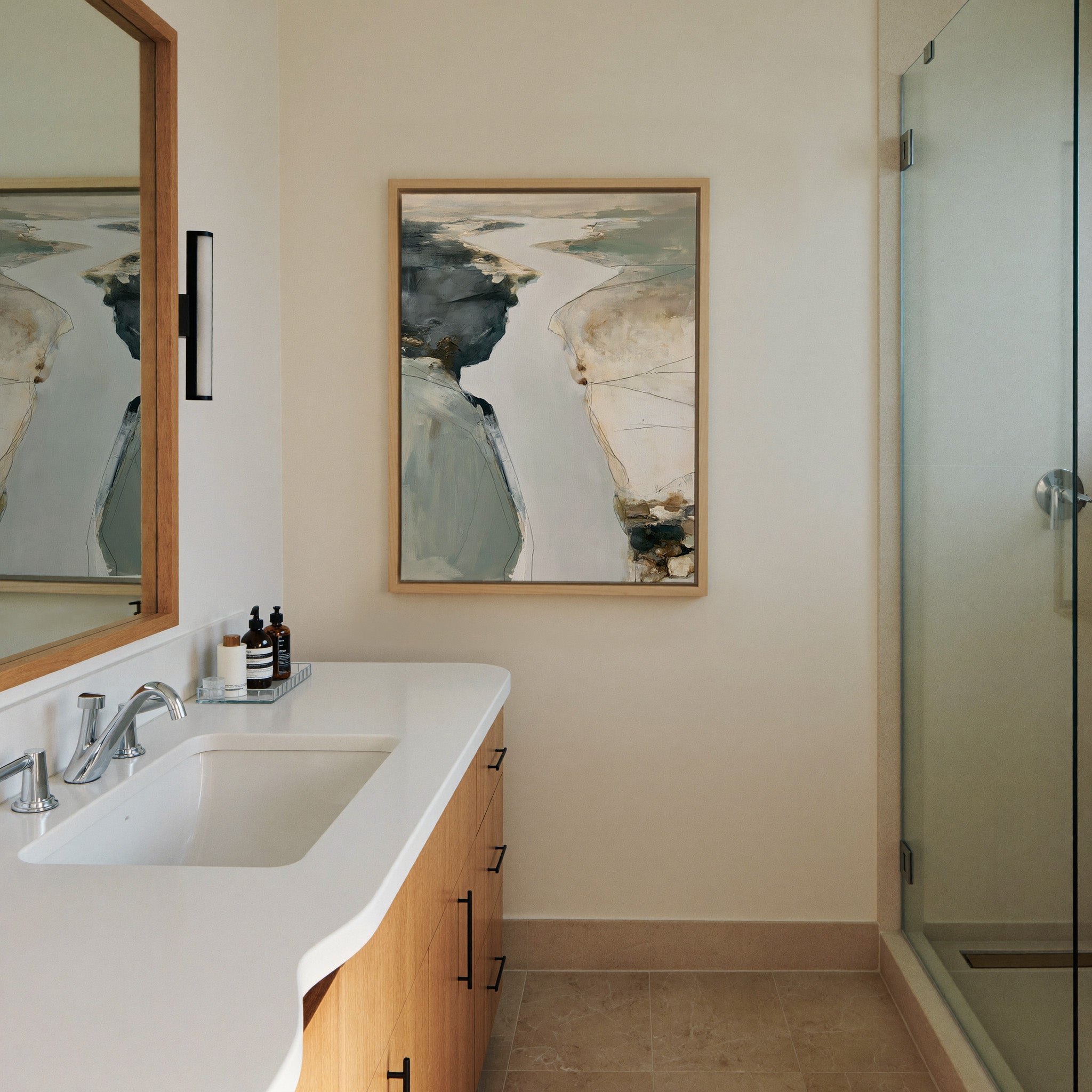 pale coastal channel abstract canvas wall art in a natural wood frame in a styled room setting