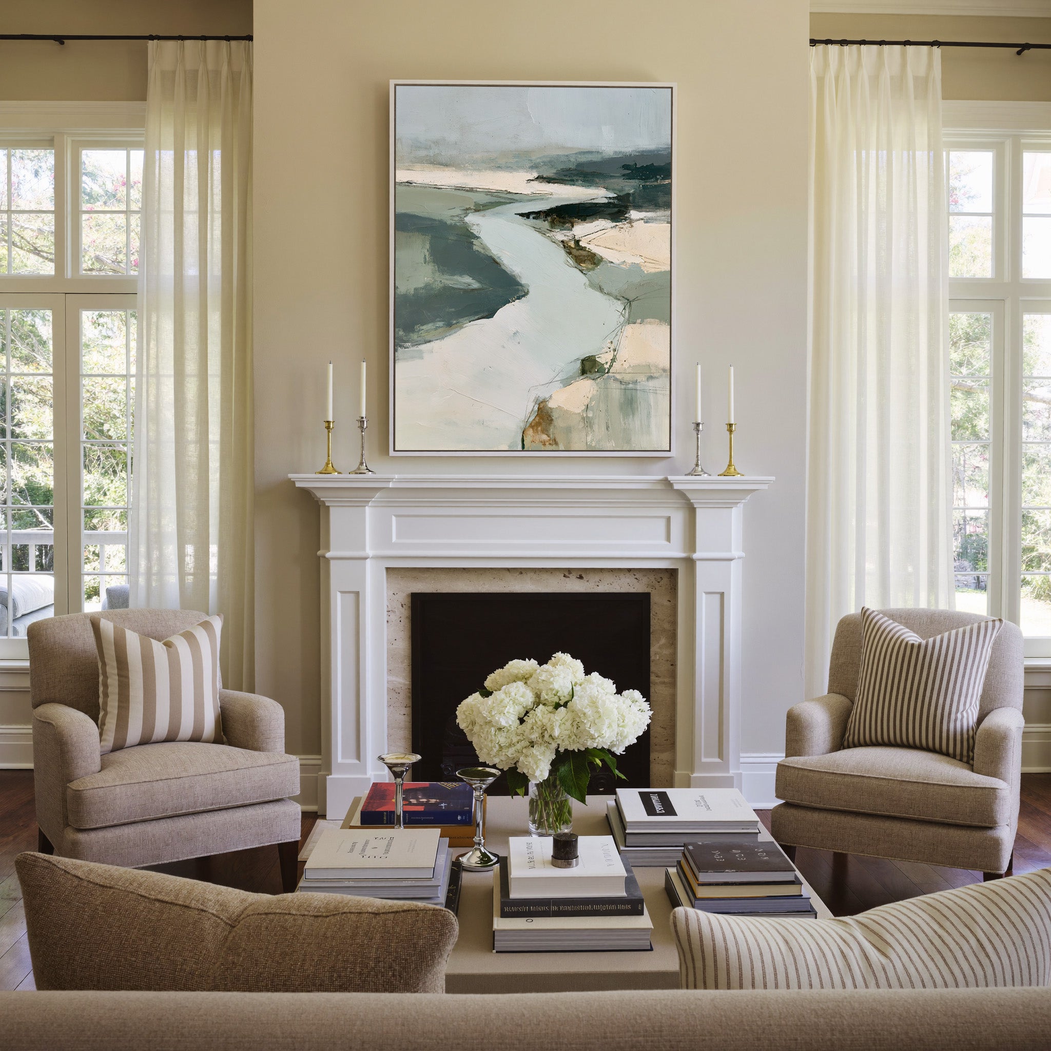 broad pale channel with slate green banks canvas wall art in a white frame above a mantel