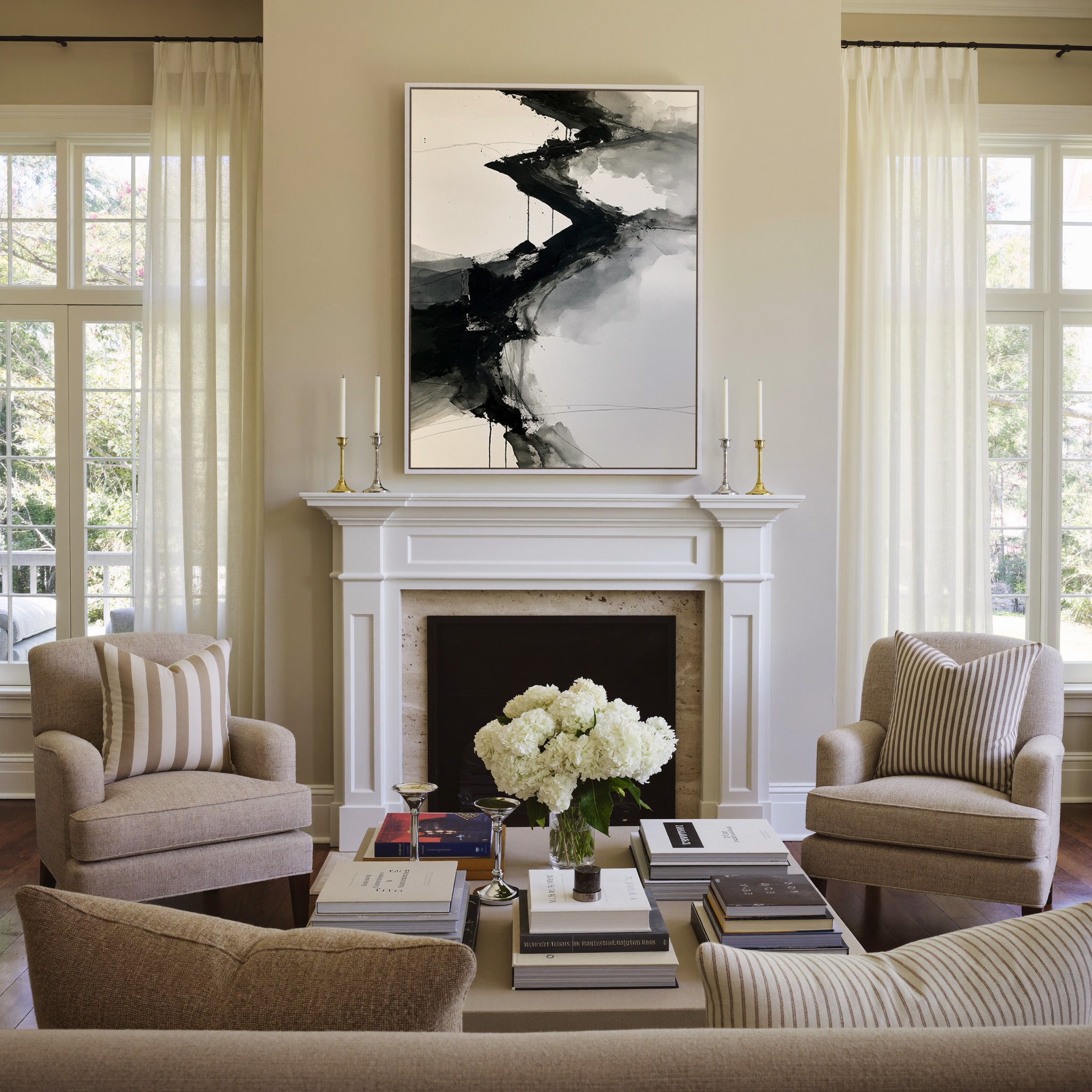 monochrome abstract with diagonal black bands canvas wall art in a white frame above a mantel