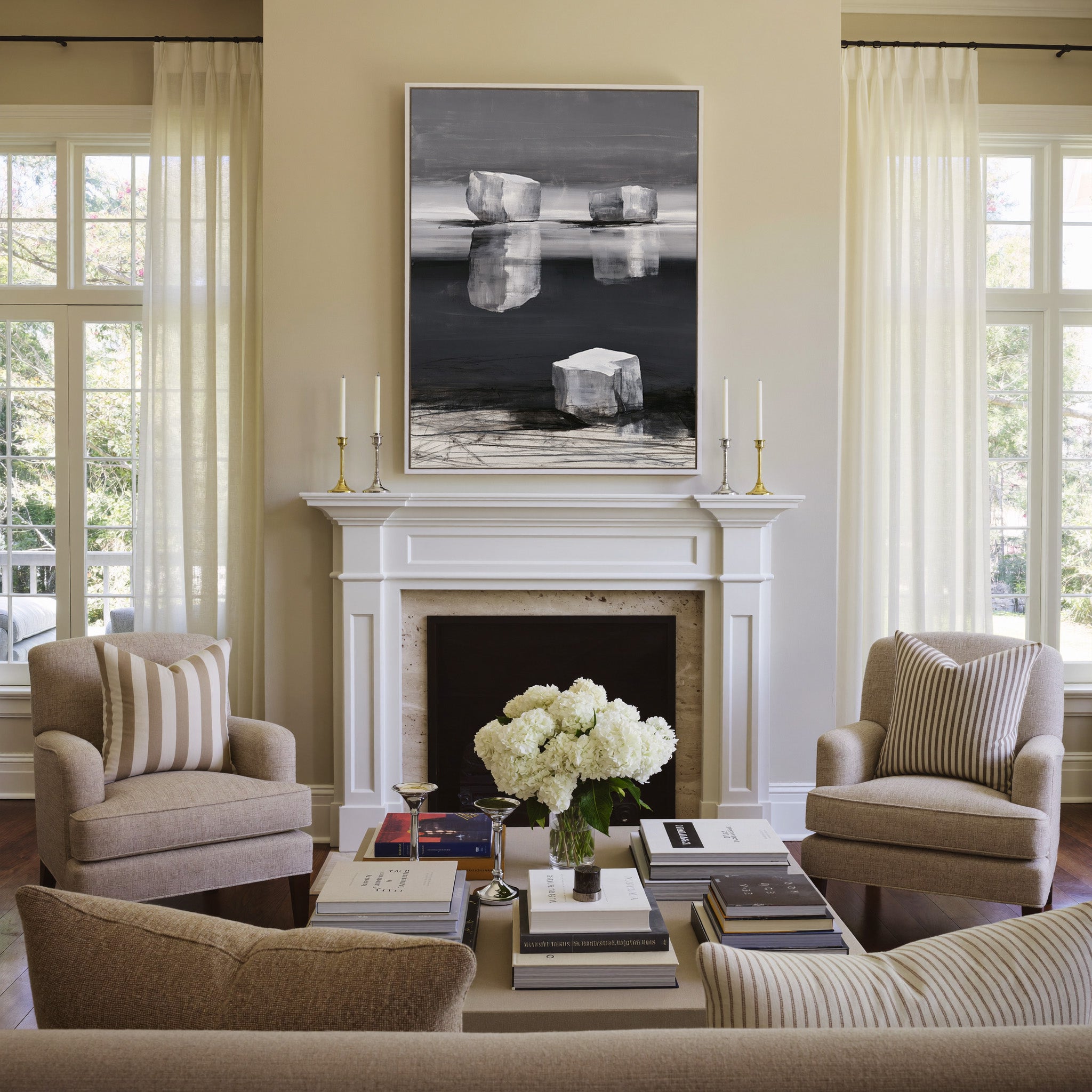 monochrome abstract with pale limestone blocks canvas wall art in a white frame above a mantel