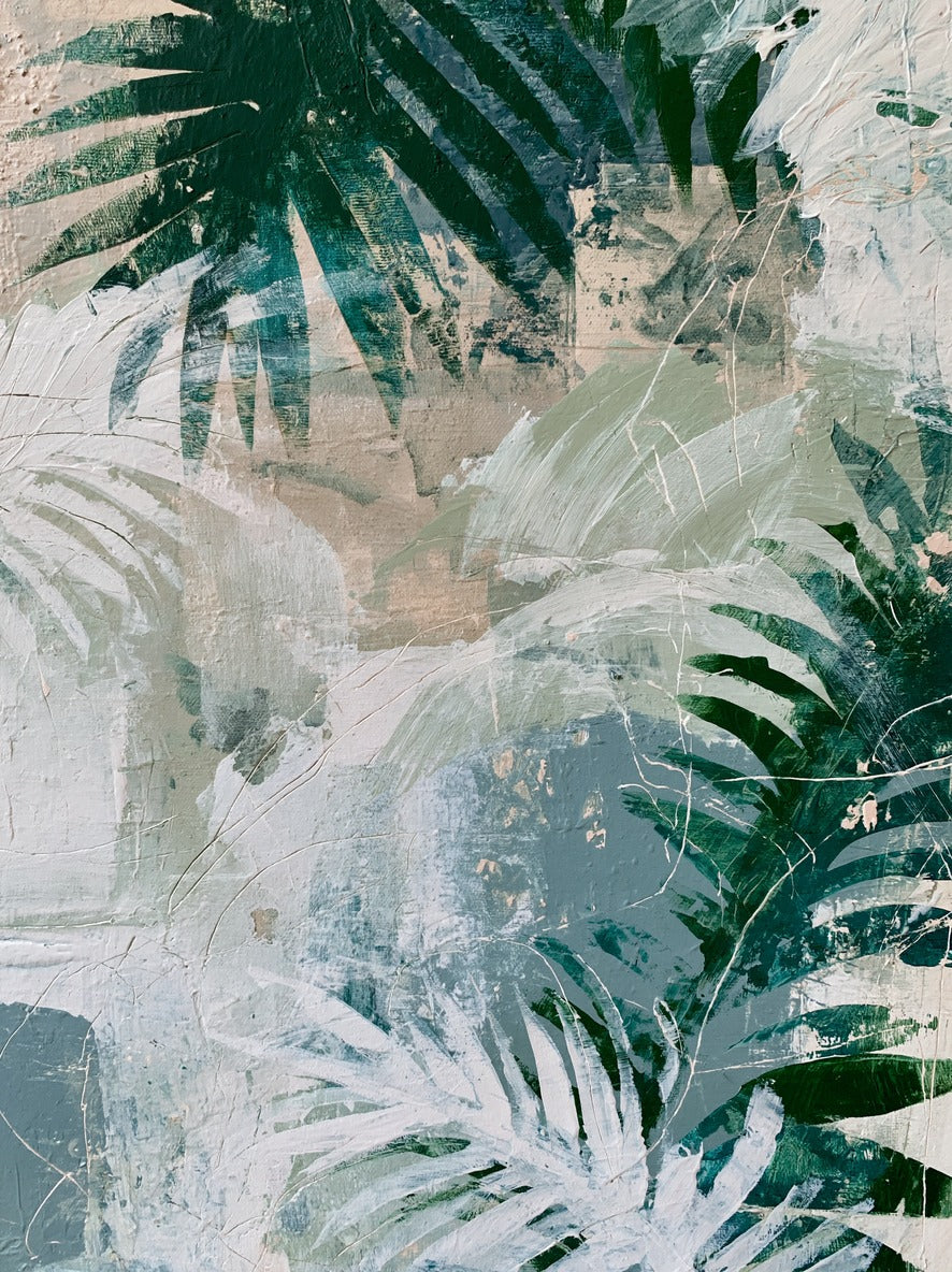 Layered fern leaves in deep green, white, and sage across a pale beige ground