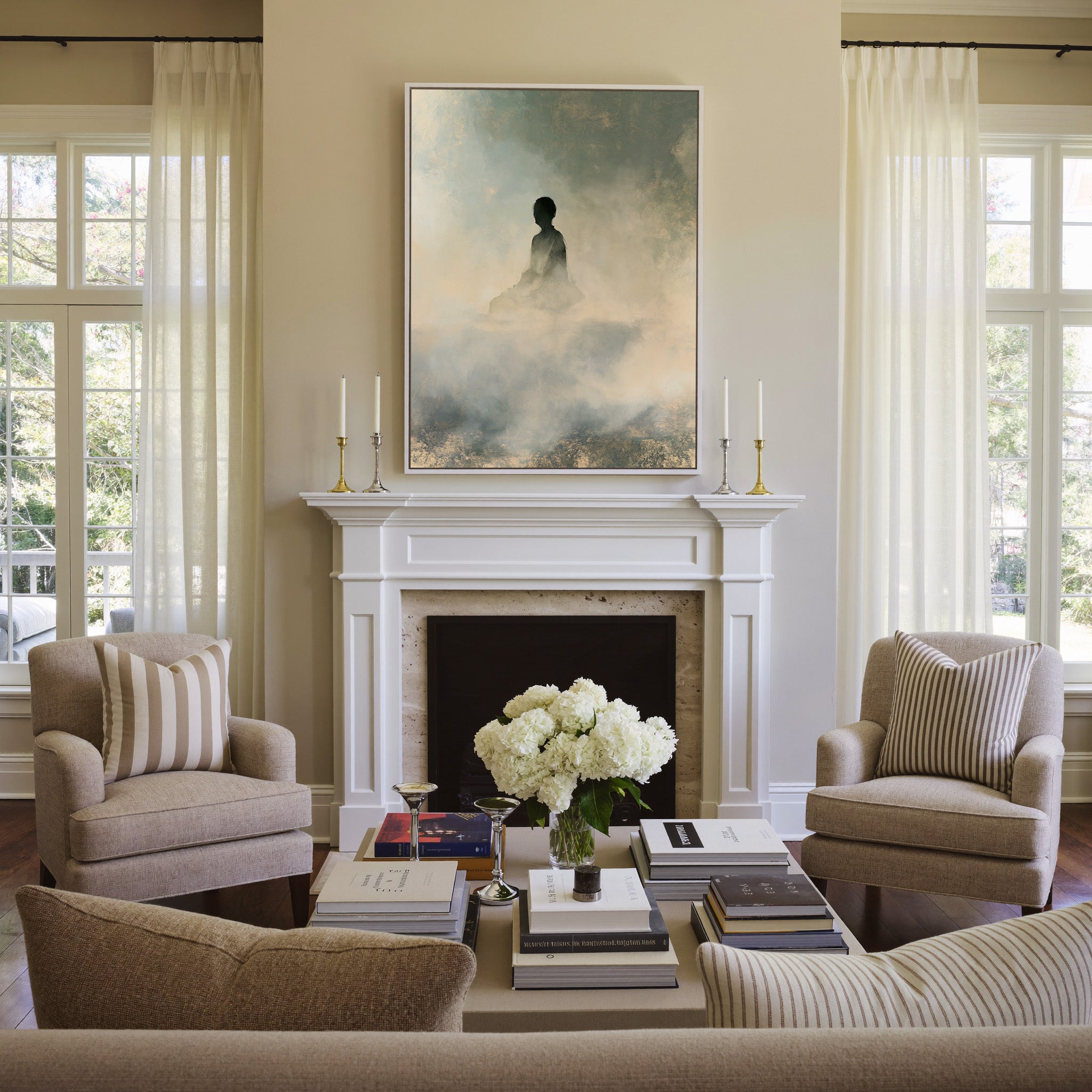 soft gray and cream seated silhouette canvas wall art in a white frame above a mantel