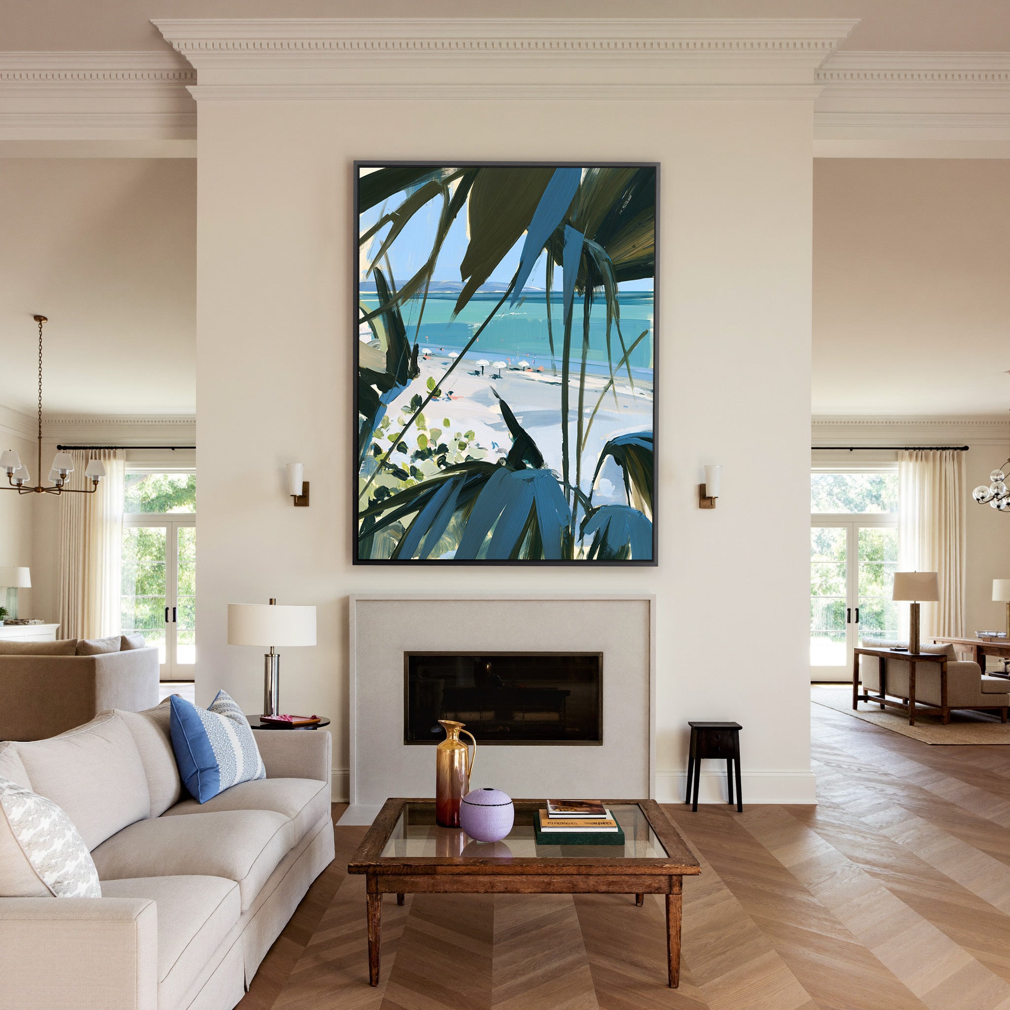 beach view through dark palm fronds canvas wall art in a black frame above a mantel