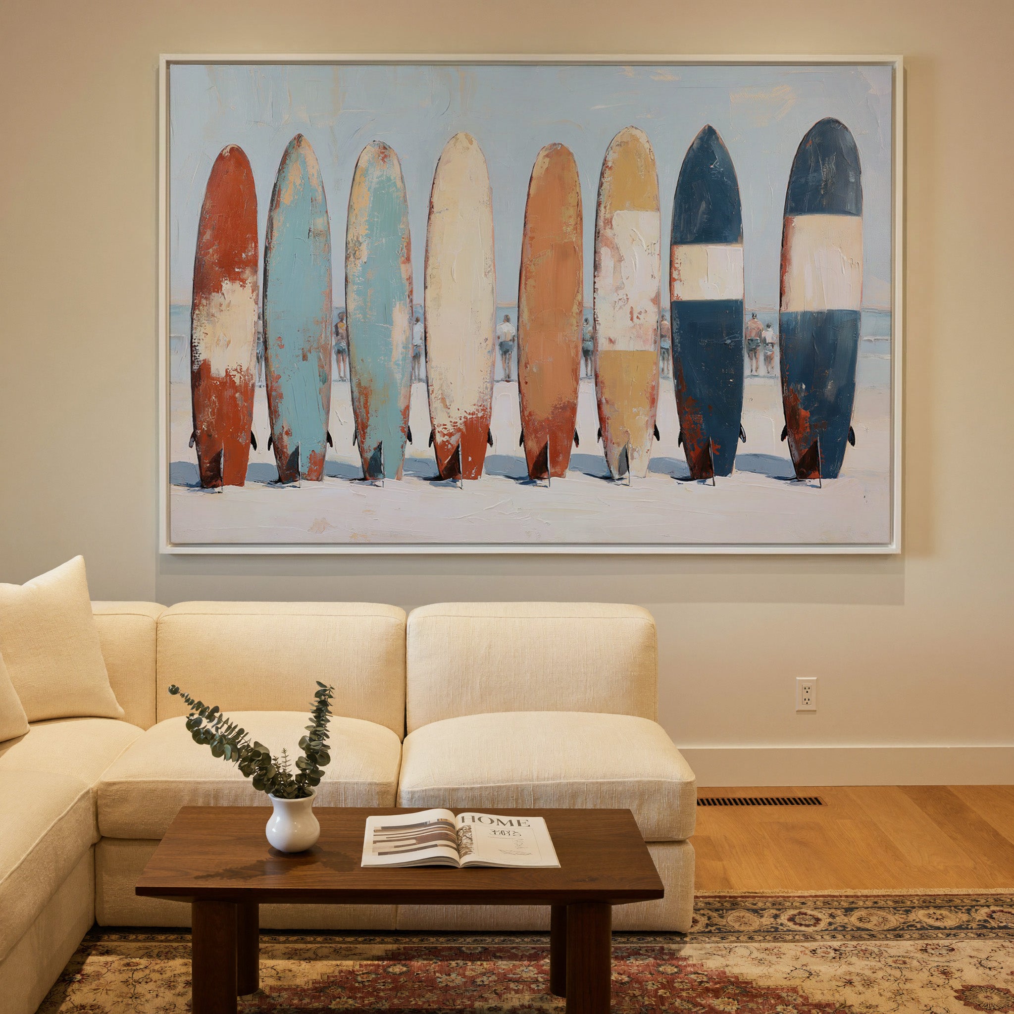 row of colorful surfboards on pale sand canvas wall art in a white frame in a styled room setting