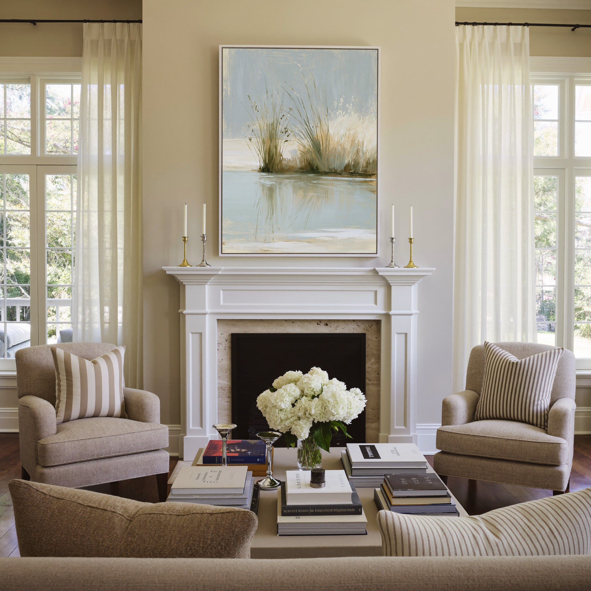 pale reeds and grasses by still water canvas wall art in a white frame above a mantel