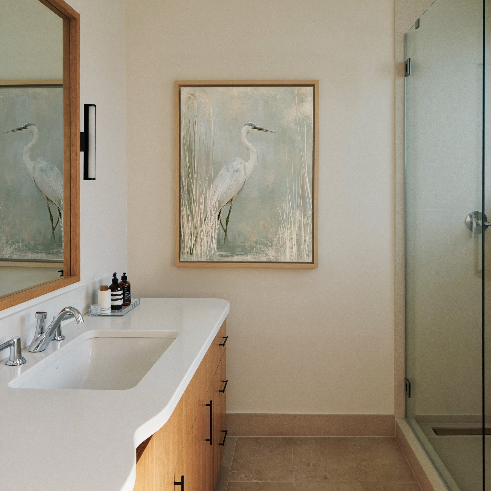 white heron among pale marsh reeds canvas wall art in a natural wood frame in a styled room setting