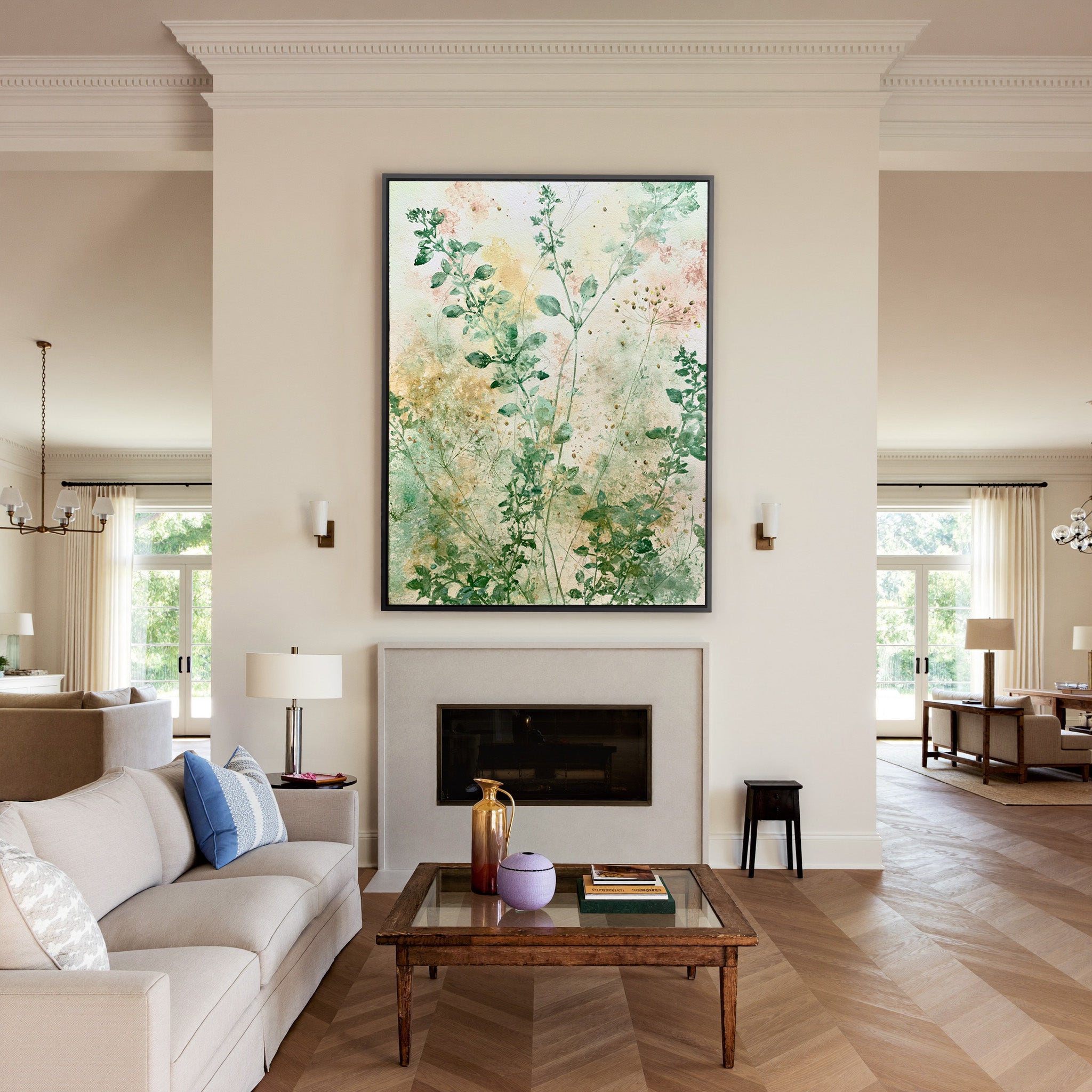 loose herb like stems in sage, cream, and blush canvas wall art in a black frame above a mantel