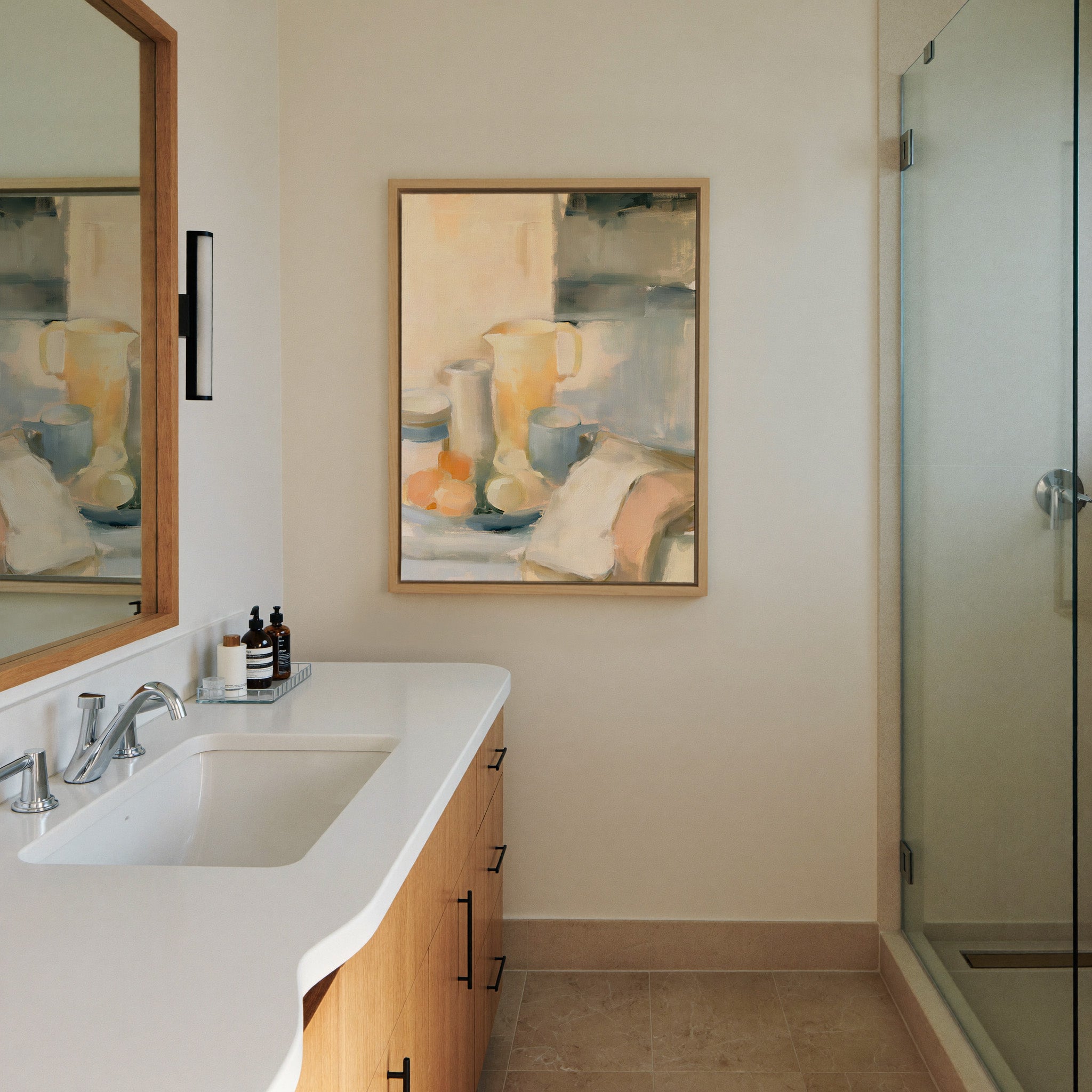 soft neutral still life with canvas wall art in a natural wood frame in a styled room setting
