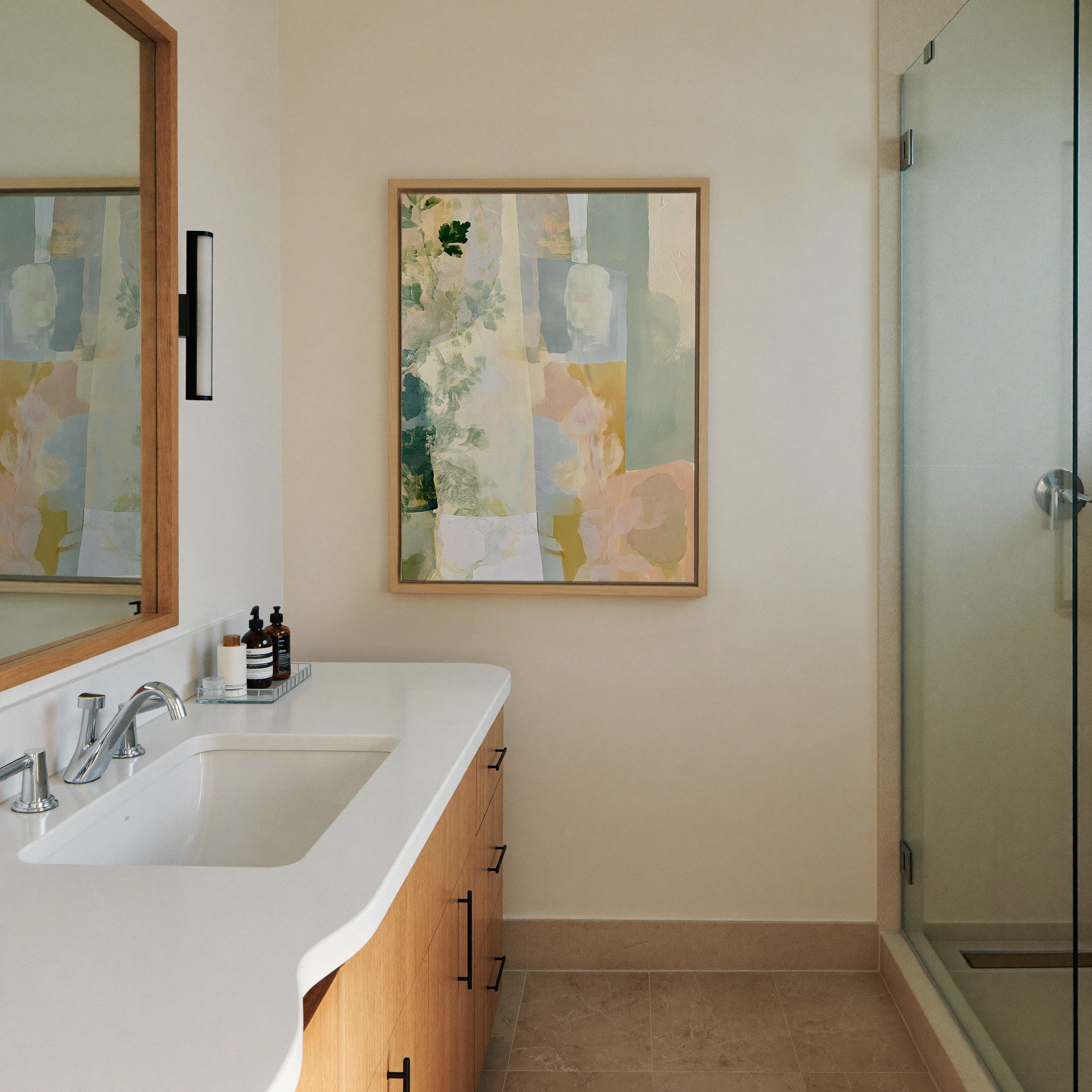 soft linen inspired abstract with sage, blue, canvas wall art in a natural wood frame in a styled room setting