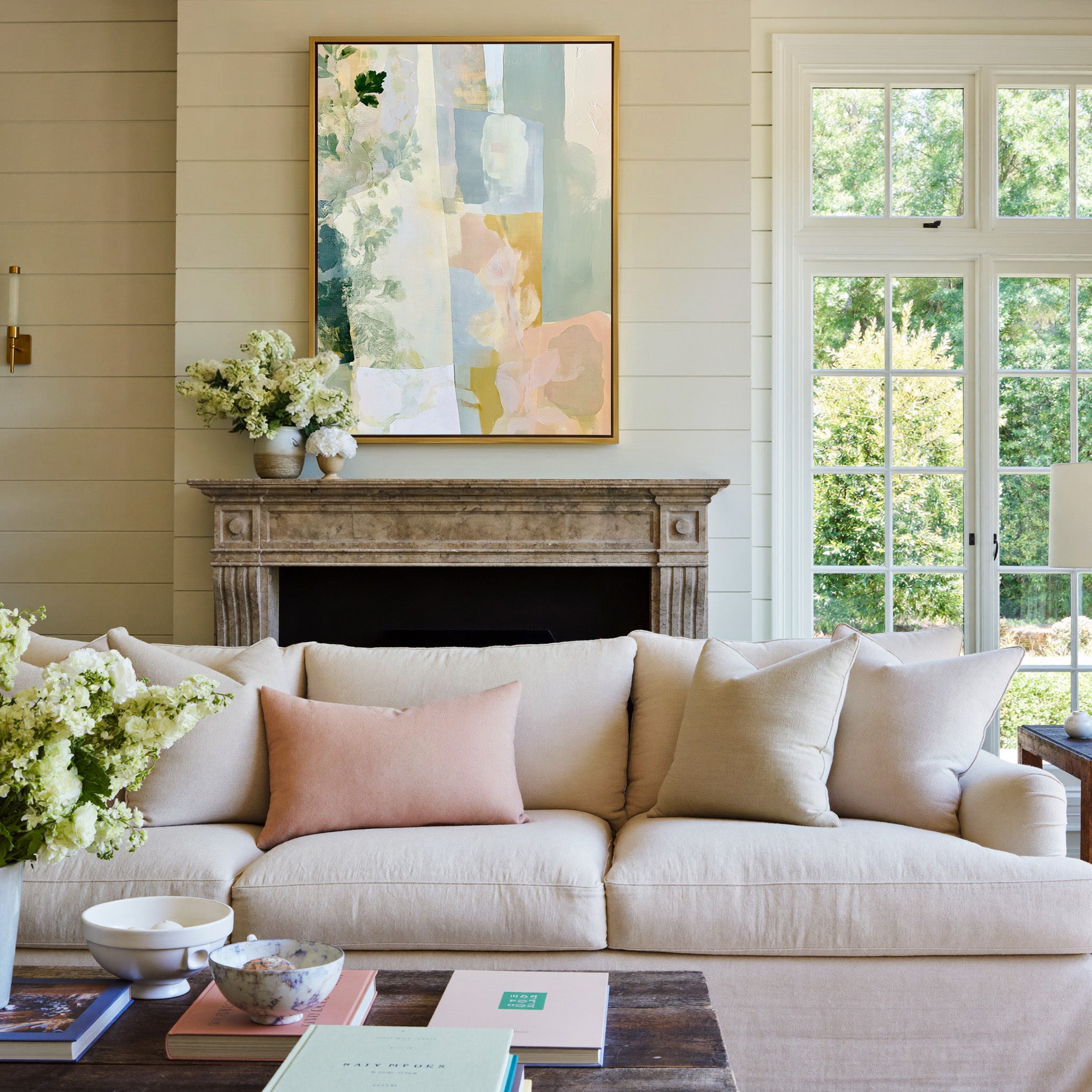 soft linen inspired abstract with sage, blue, canvas wall art in a gold frame above a mantel