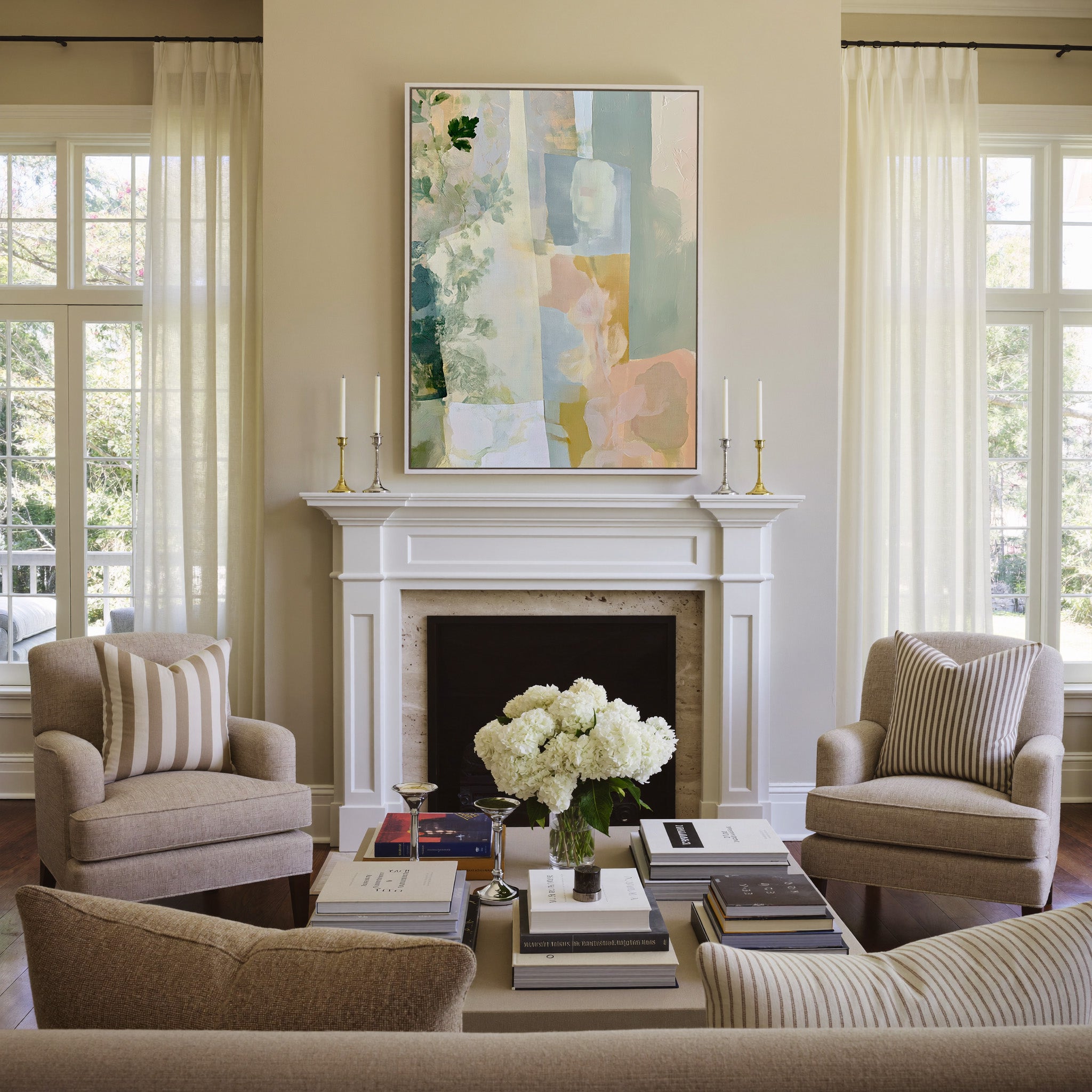 soft linen inspired abstract with sage, blue, canvas wall art in a white frame above a mantel