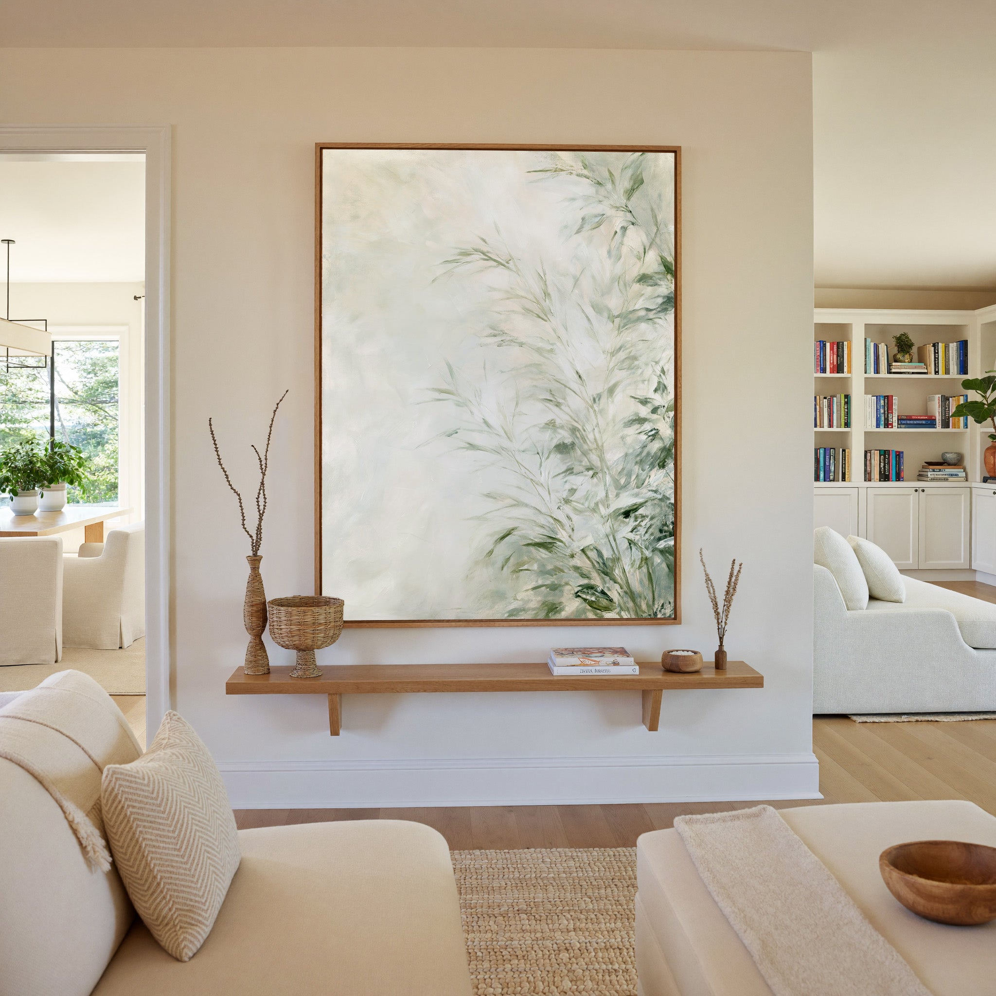soft sage and cream botanical abstract canvas wall art in an oak frame in a living room