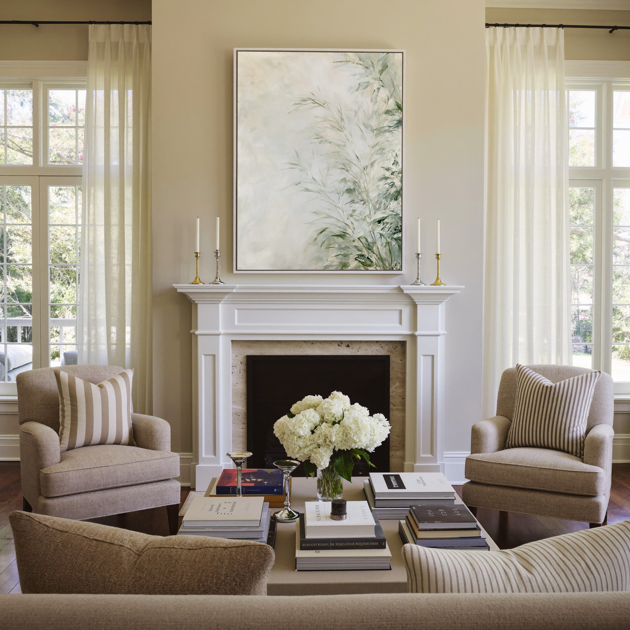 soft sage and cream botanical abstract canvas wall art in a white frame above a mantel