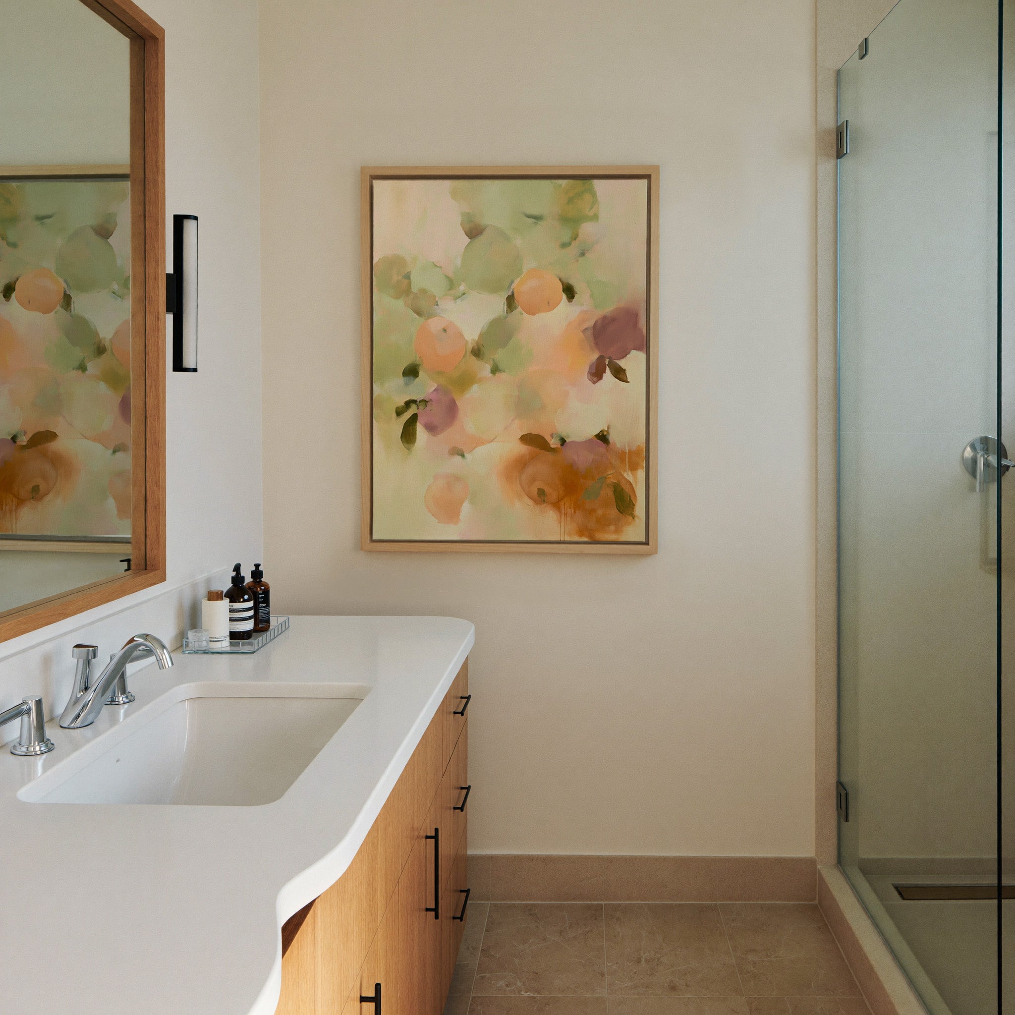 soft orchard toned abstract with pale green, canvas wall art in a natural wood frame in a styled room setting