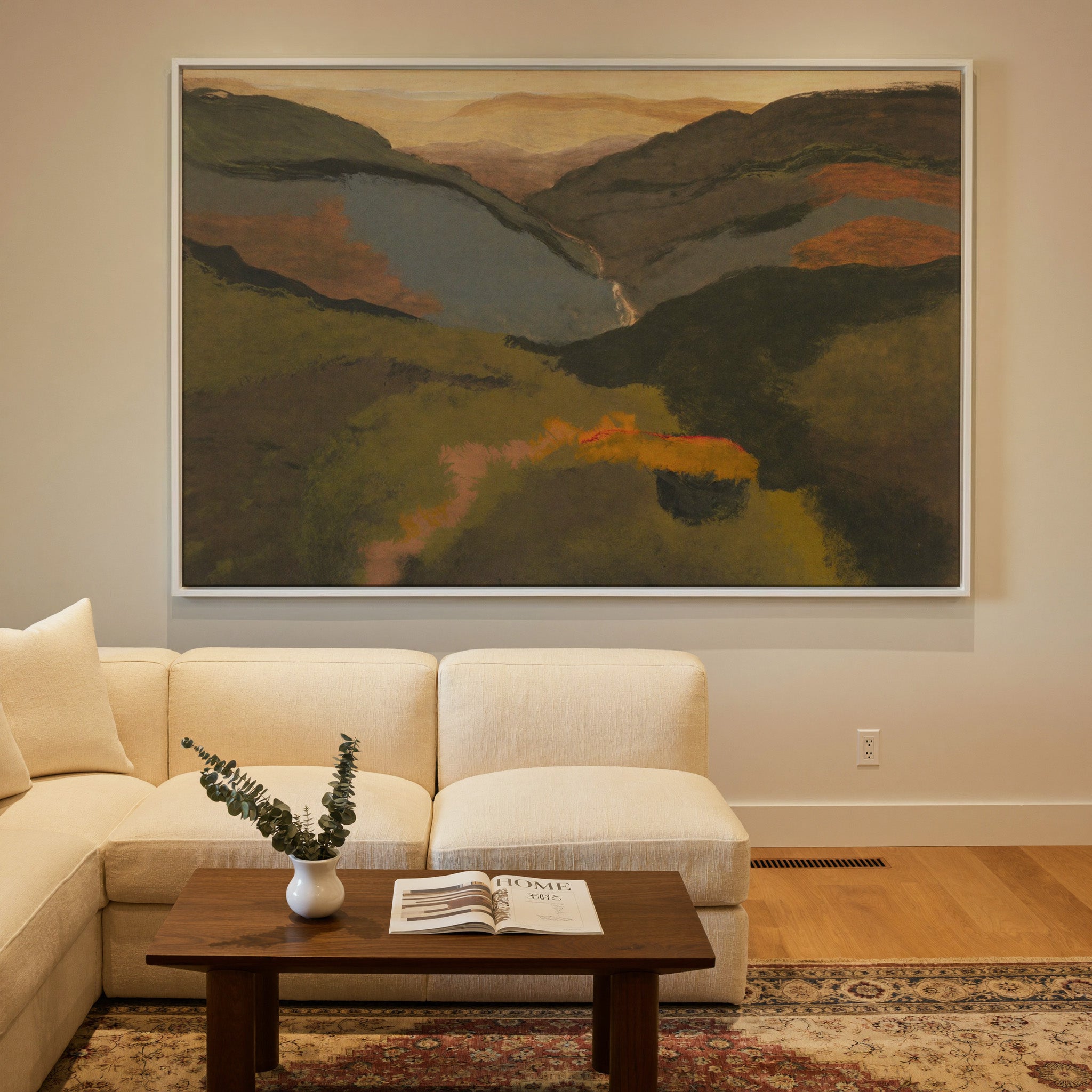 layered mountain valley at dusk canvas wall art in a white frame in a styled room setting
